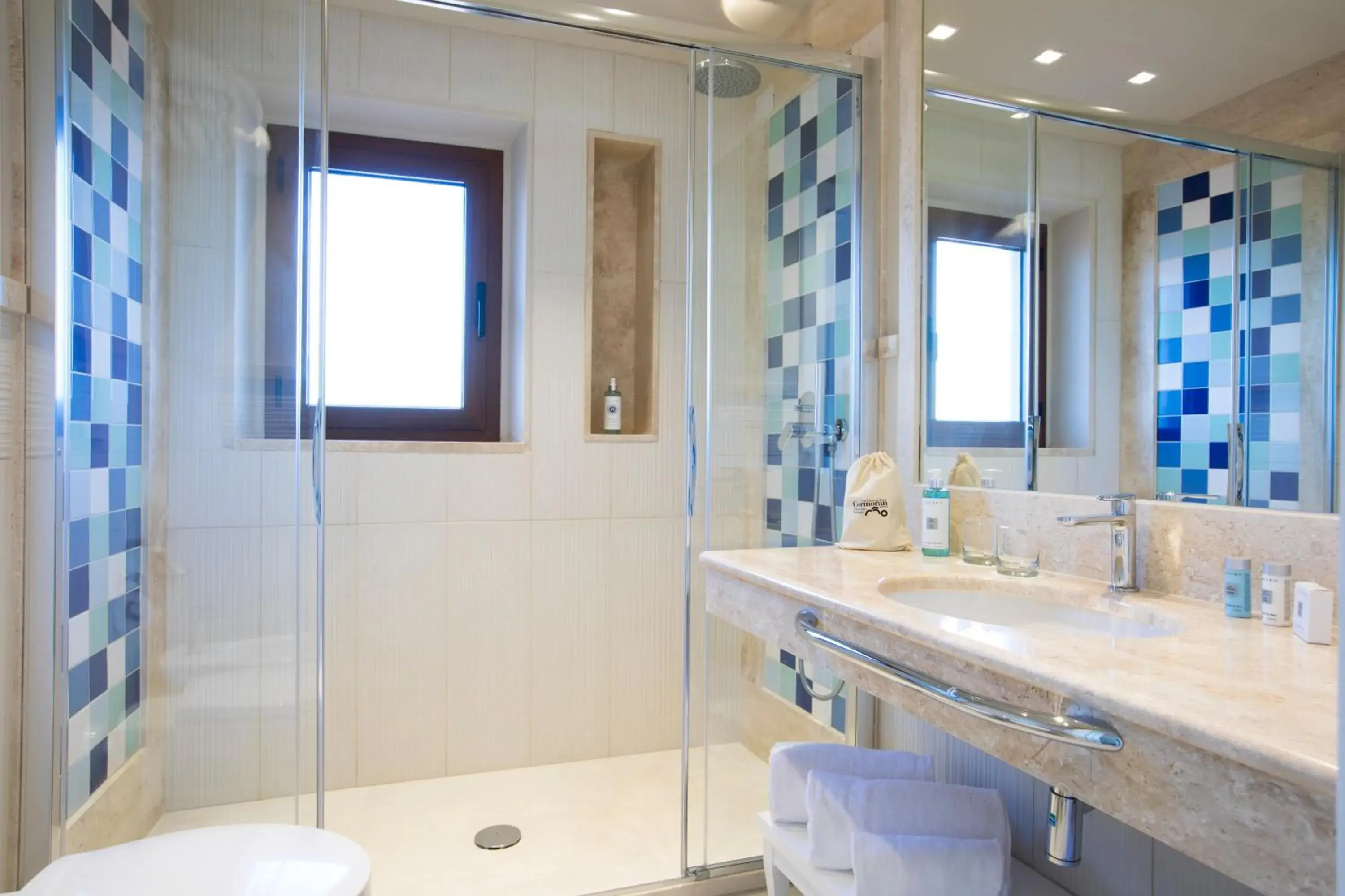 Bathroom in Cormoran Hotel & Residence Bathroom in Cormoran Hotel & Residence