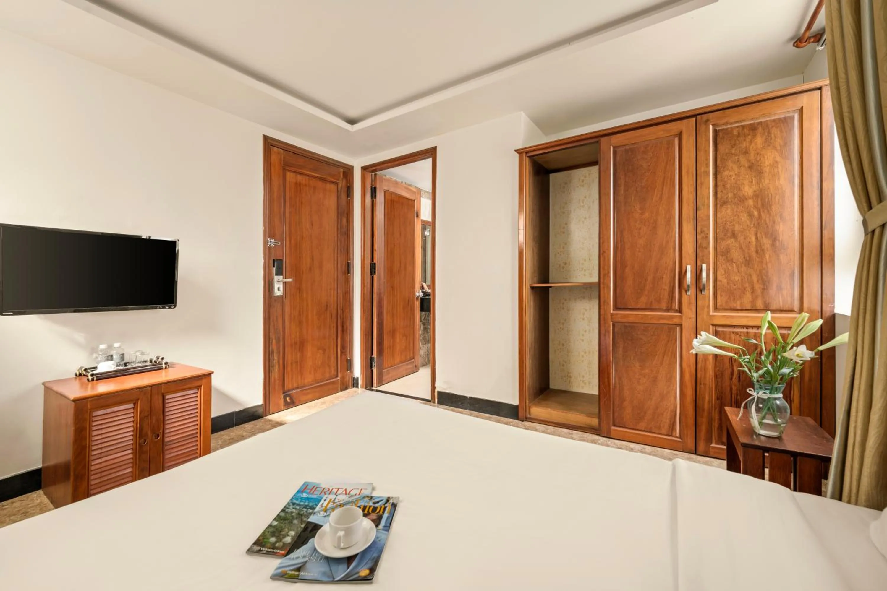 Communal lounge/ TV room, Bed in Titan Hotel Da Nang