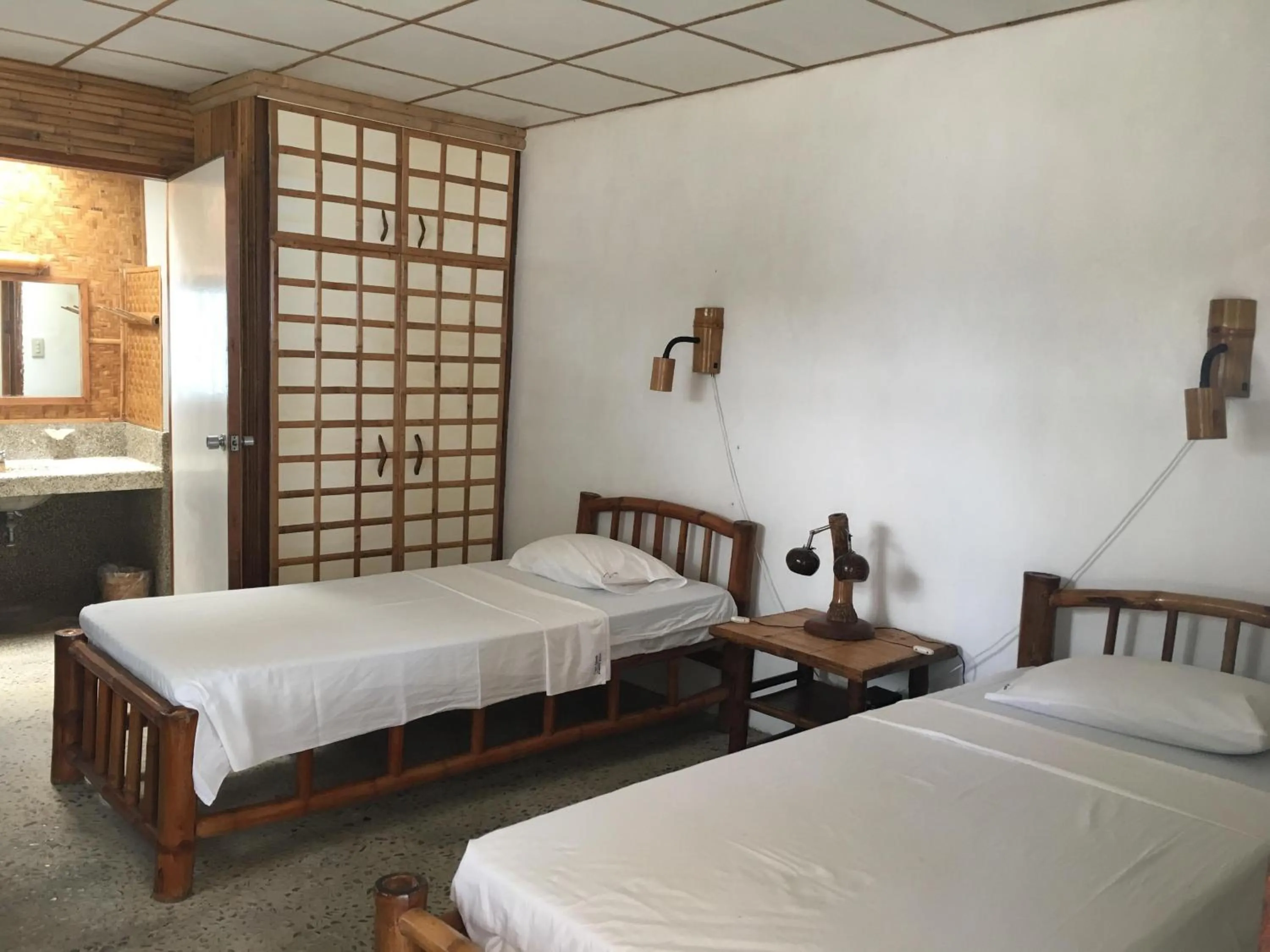 Bed in Costa Aguada Island Resort, Inampulugan Island, Sibunag, Guimaras
