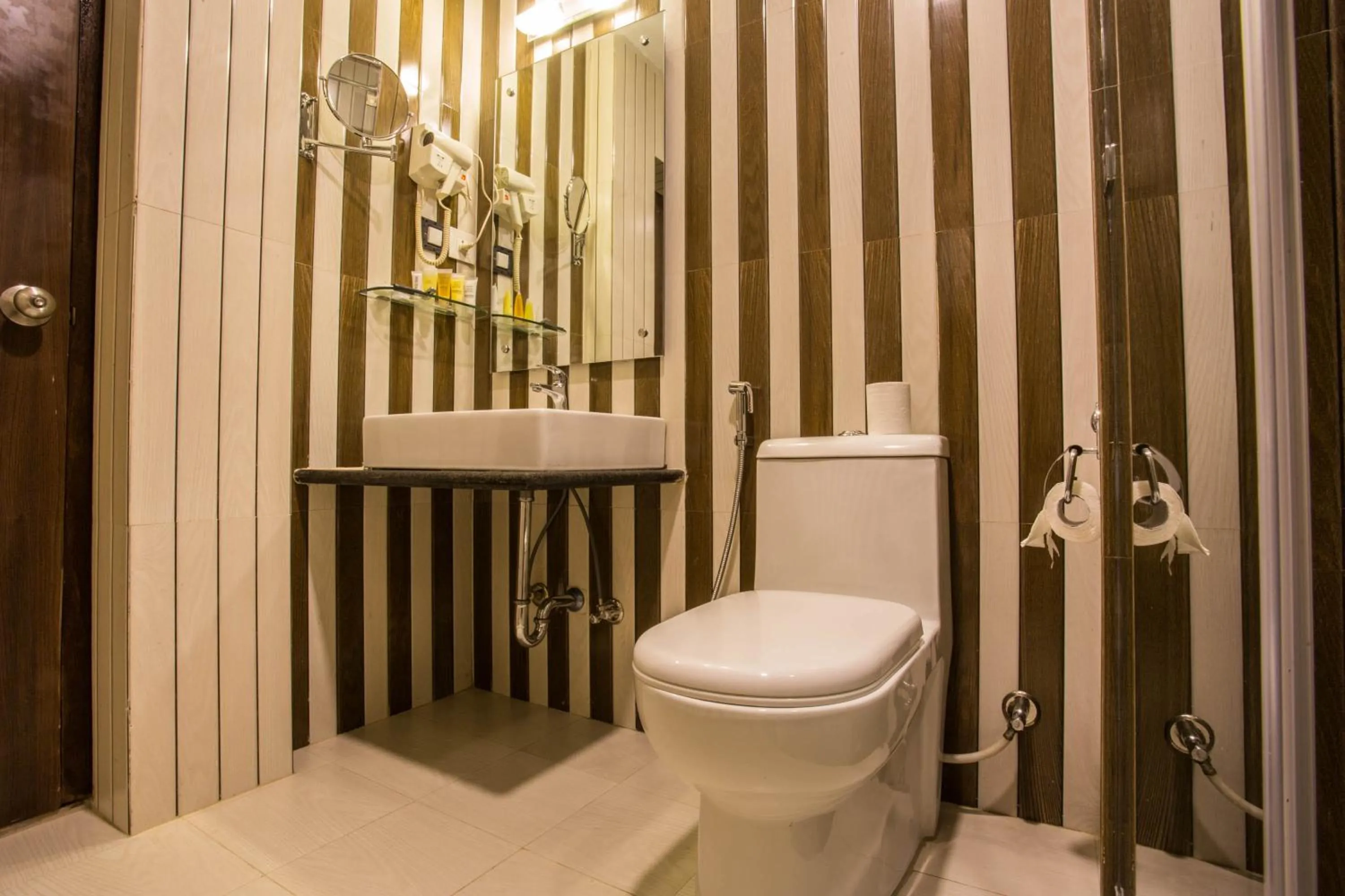 Toilet in Yatri Suites and Spa