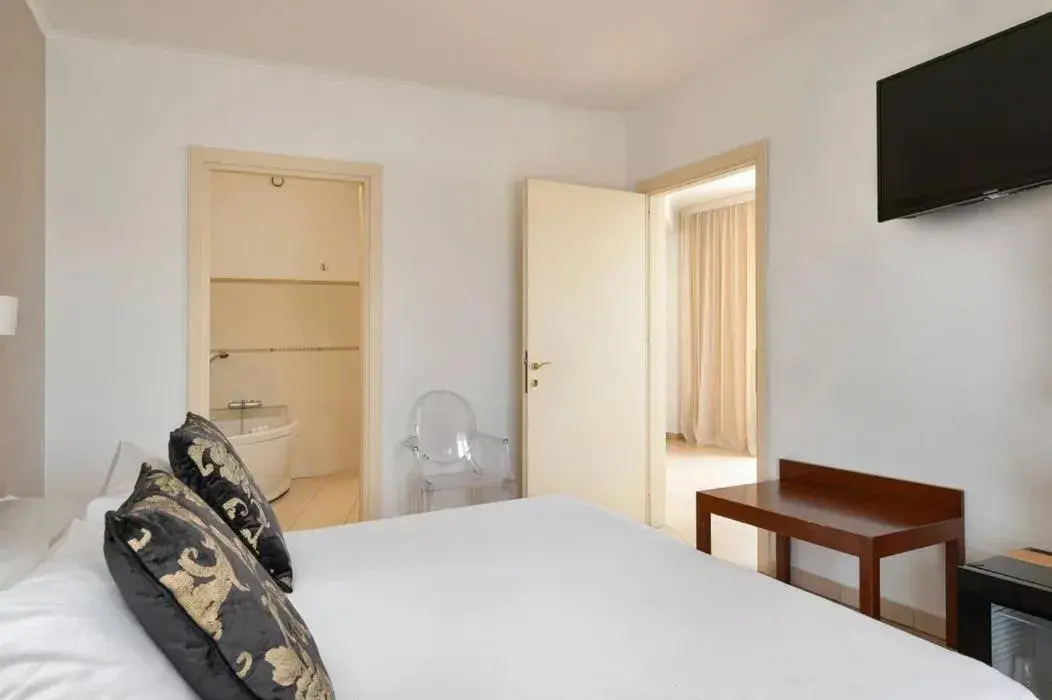 TV and multimedia, Bed in Grand Hotel Sofia TV and multimedia, Bed in Grand Hotel Sofia