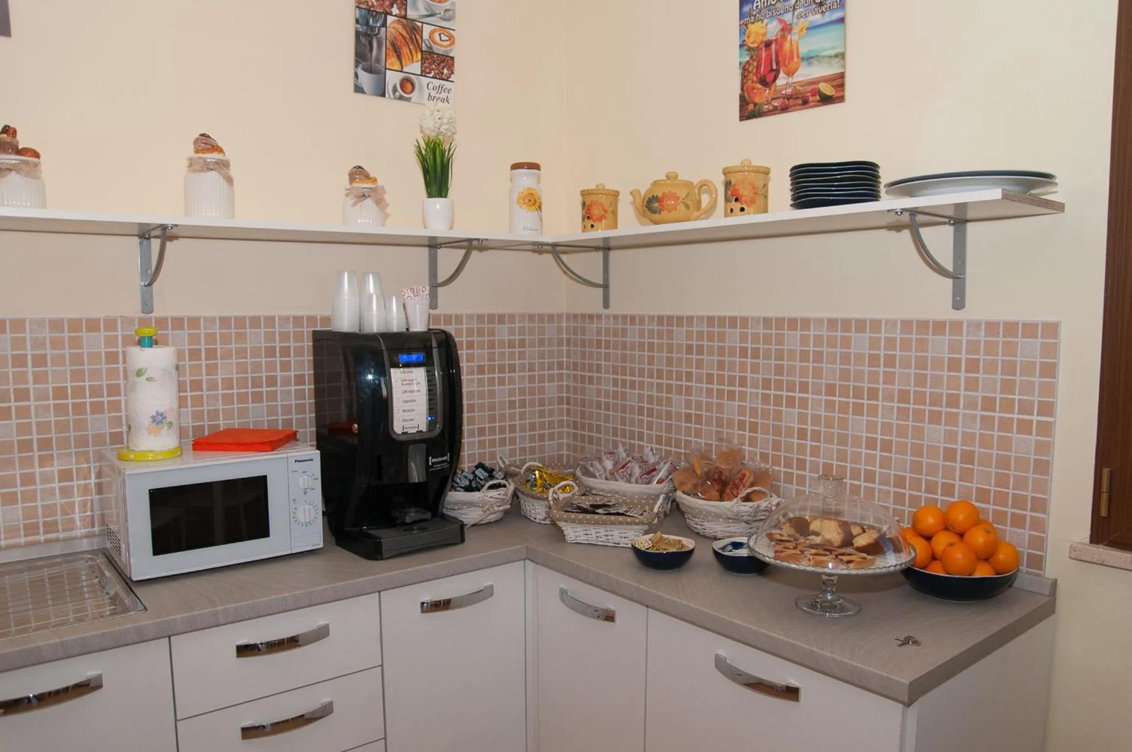 Communal kitchen in B&B L'Orizzonte