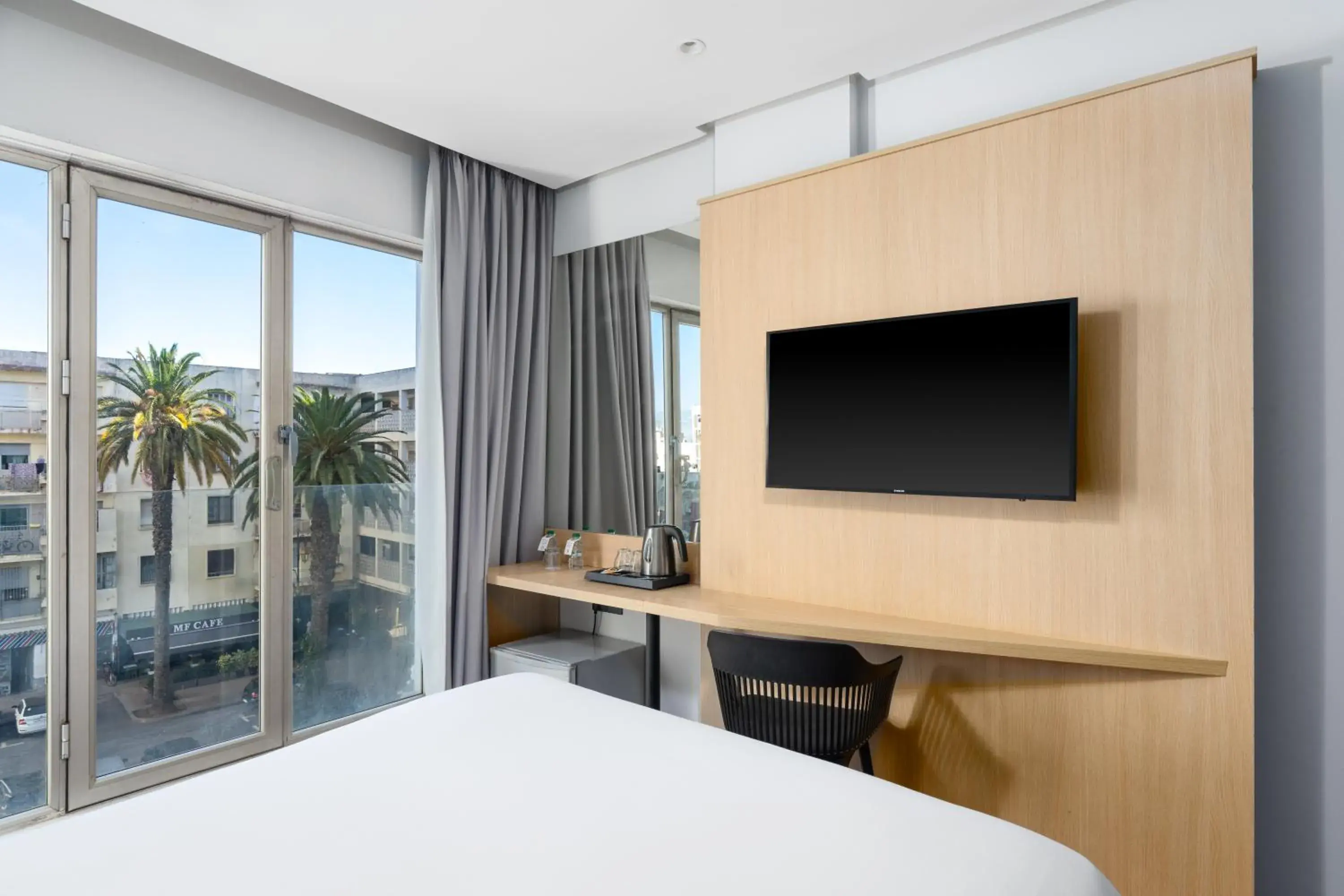 Communal lounge/ TV room, Bed in Rihab Hotel Communal lounge/ TV room, Bed in Rihab Hotel