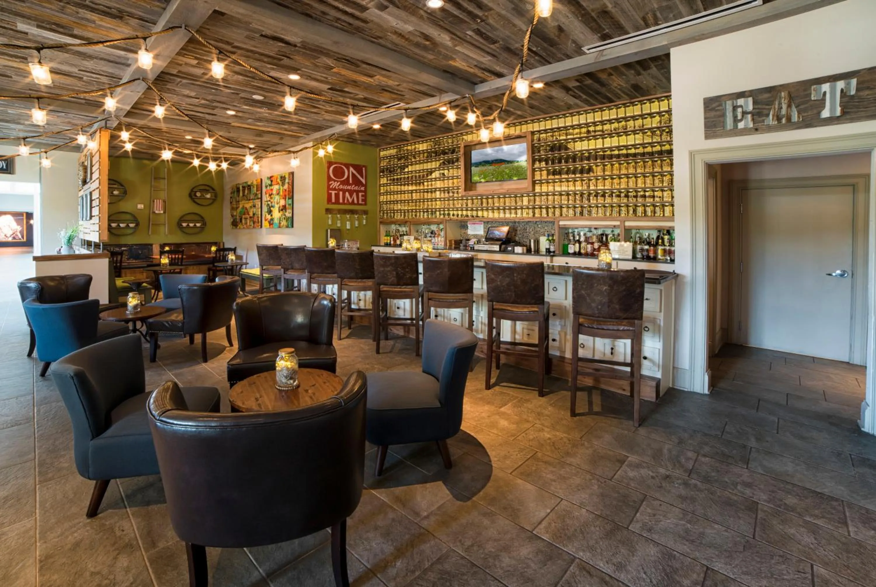 Communal lounge/ TV room in Dollywood's DreamMore Resort and Spa