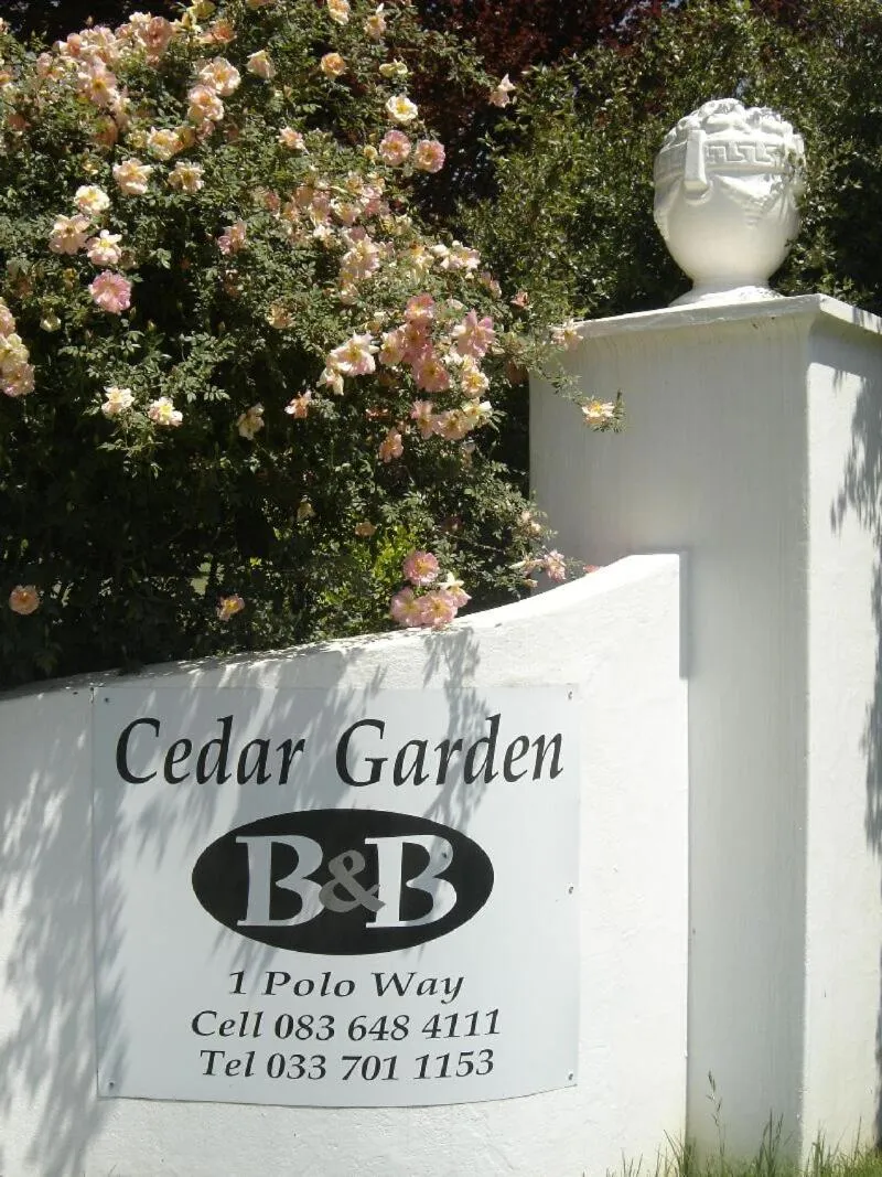 Property logo or sign in Cedar Garden
