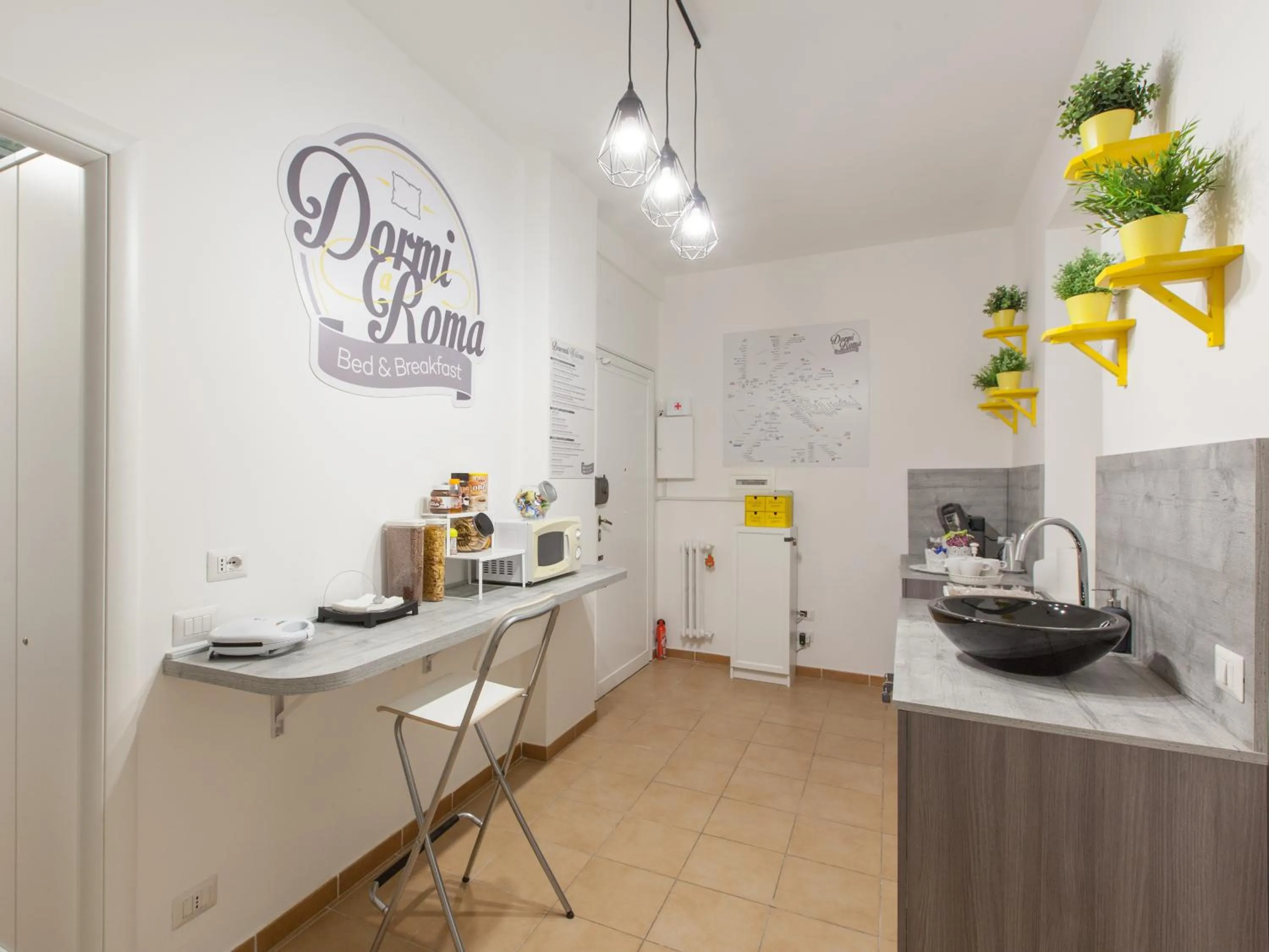 Kitchen or kitchenette in Dormi a Roma