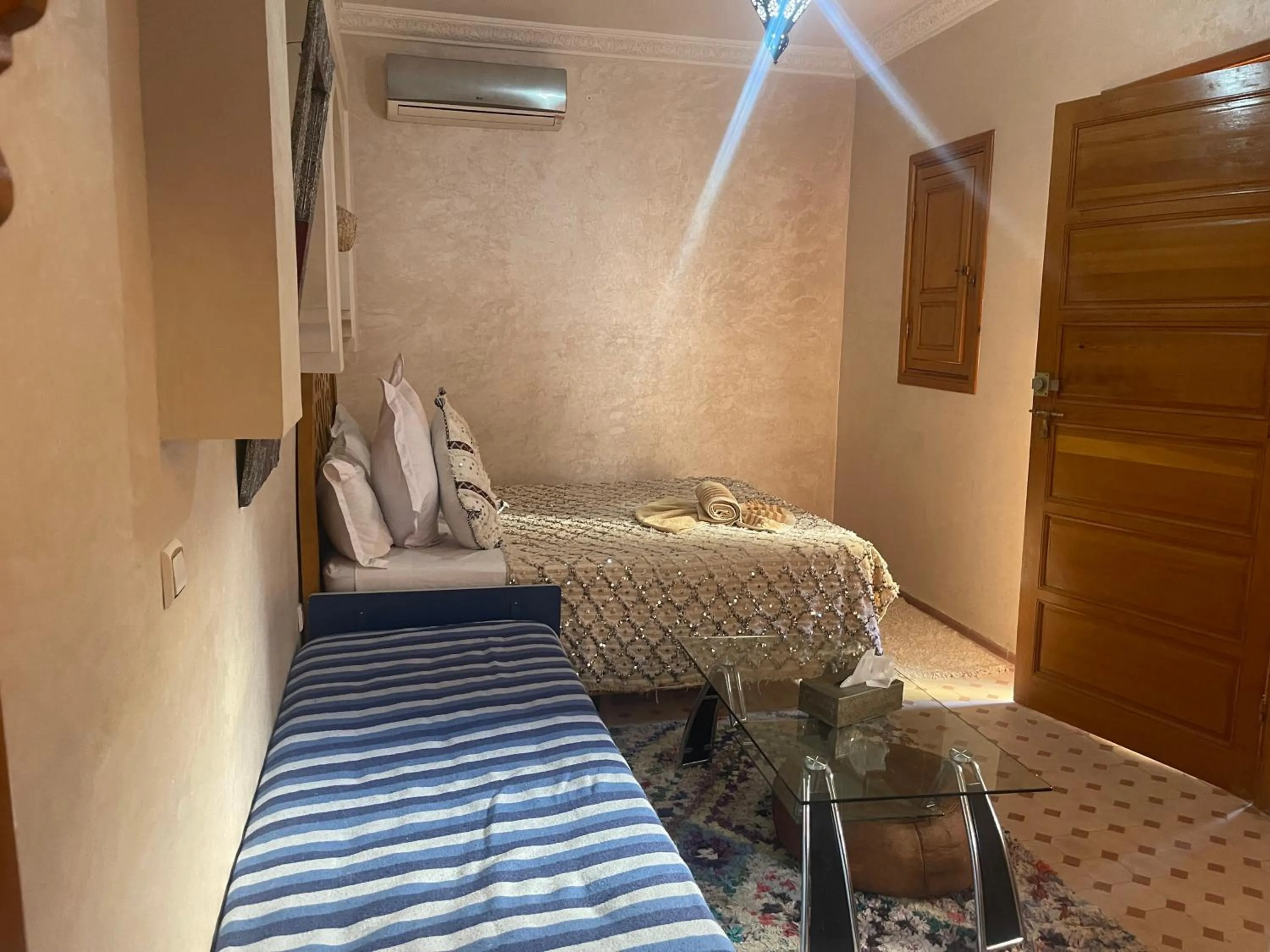 Bed in Riad Jenan Adam
