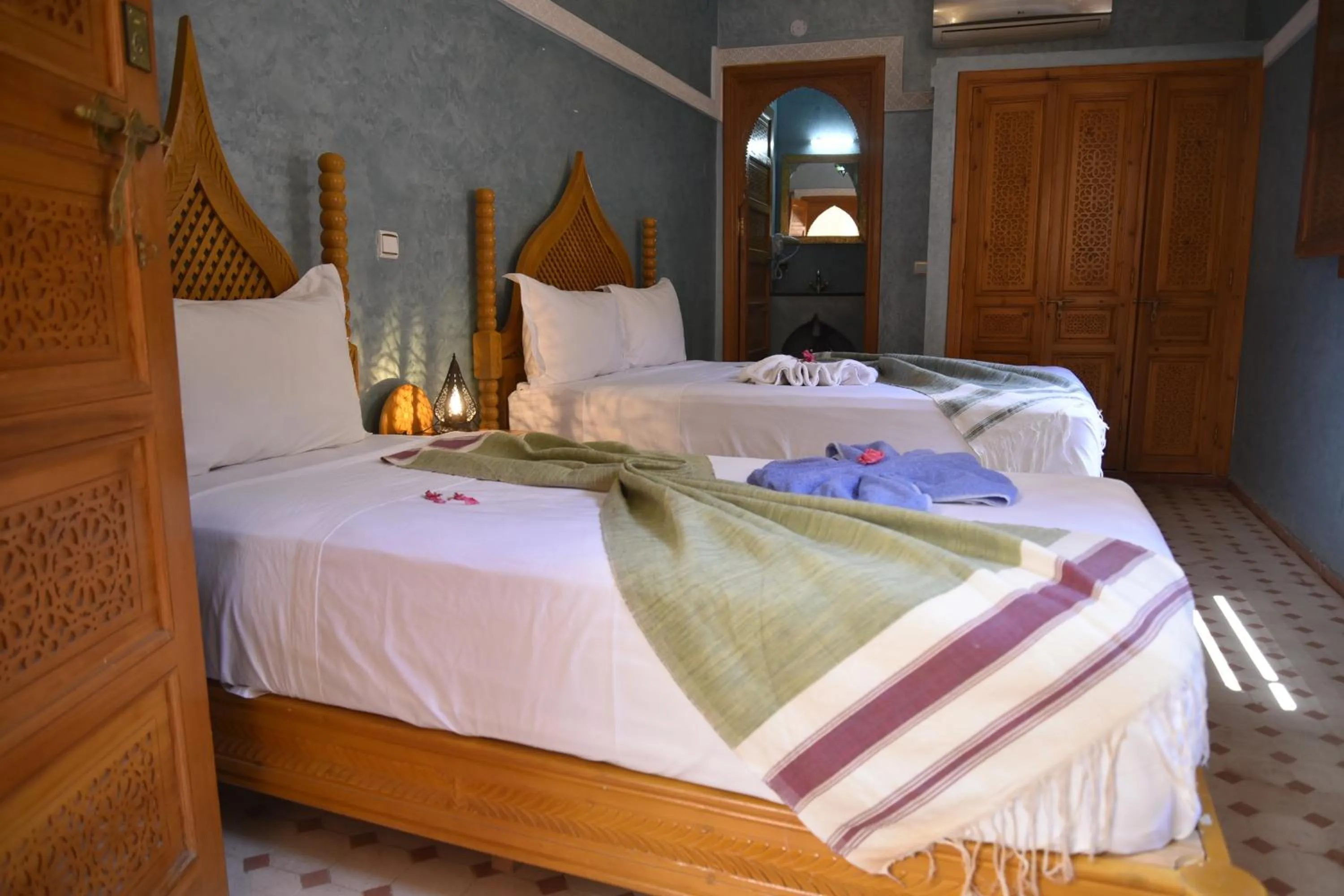 Bed in Riad Jenan Adam