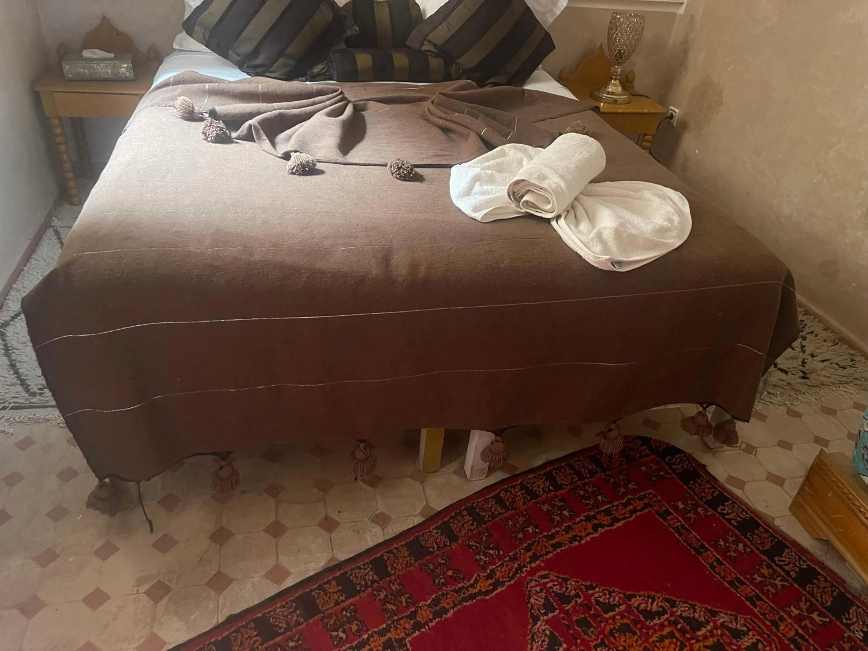 Bed in Riad Jenan Adam