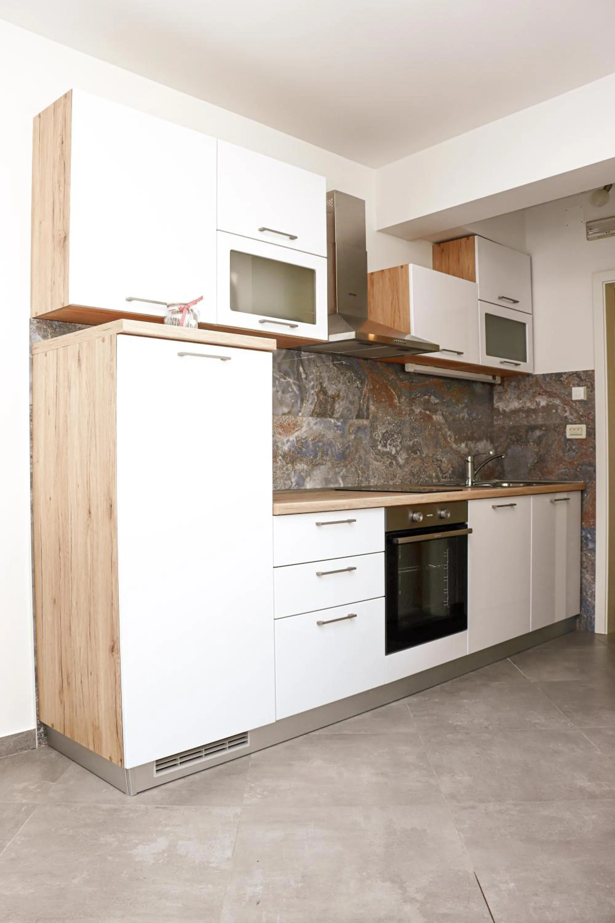 Kitchen or kitchenette in Imperium Apartments
