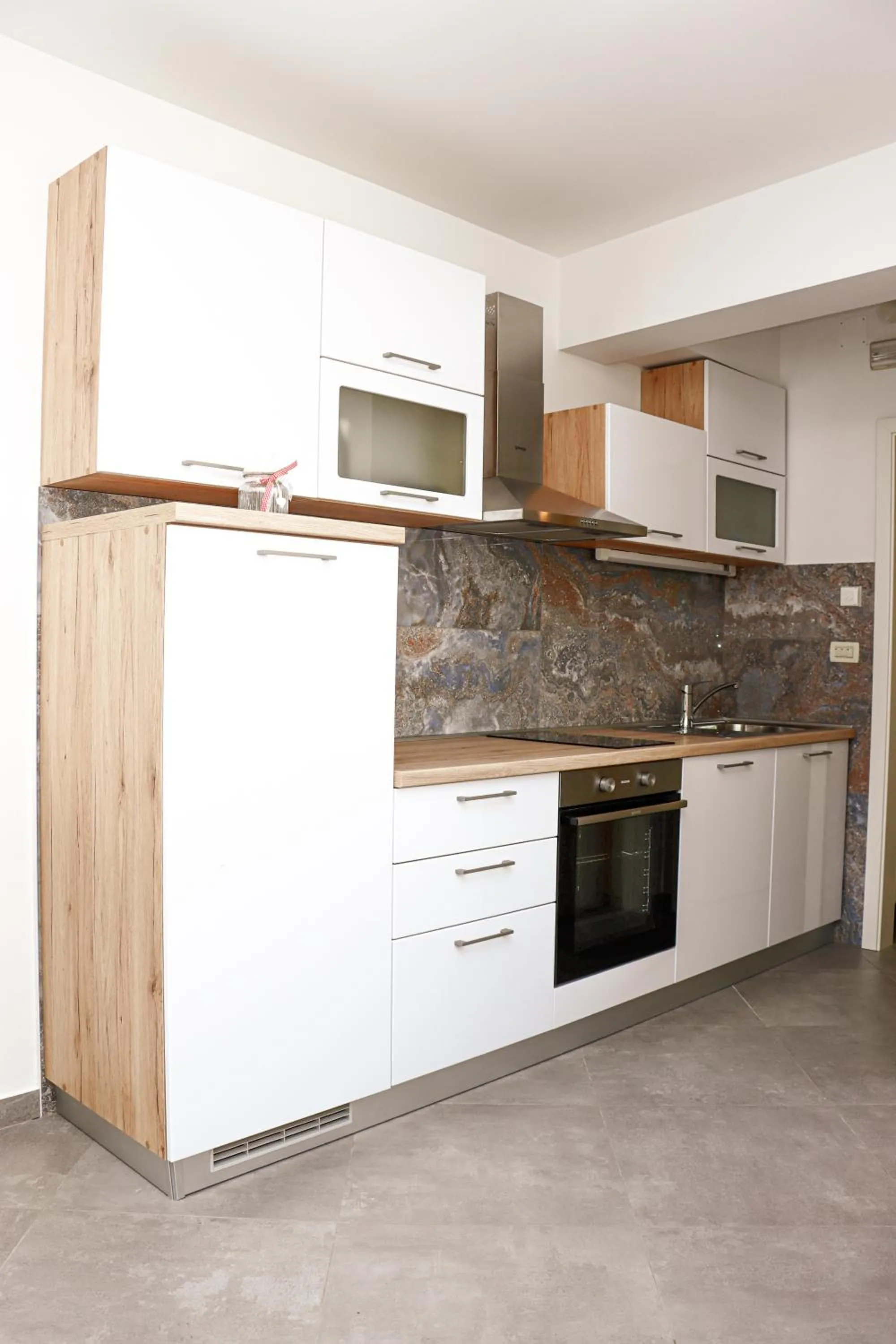 Kitchen or kitchenette in Imperium Apartments