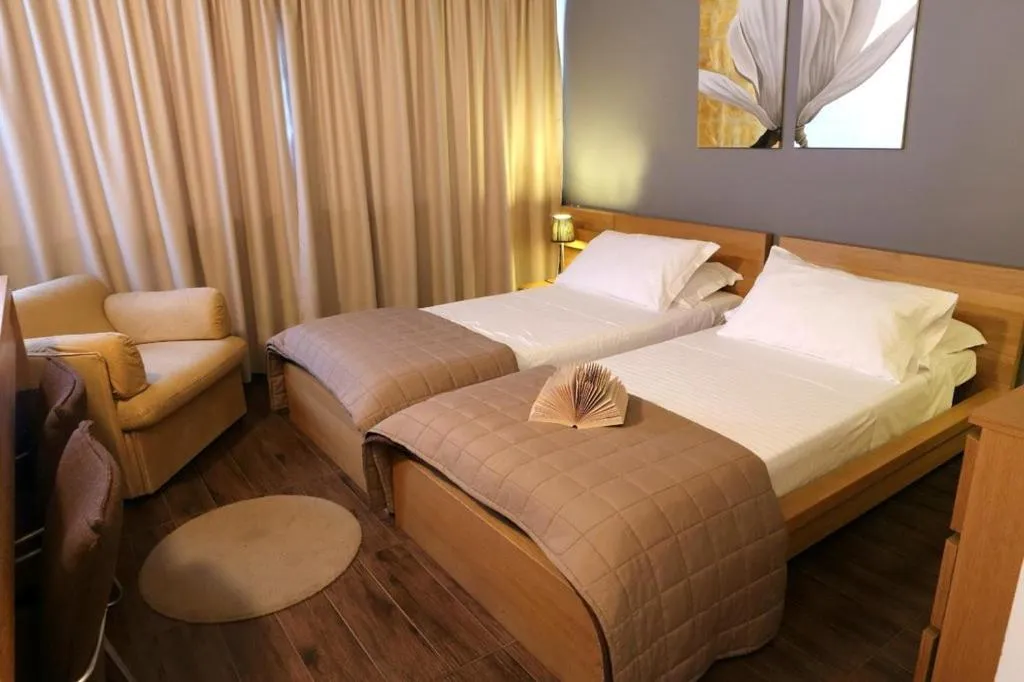 Bed in Michelangelo Etna Hotel