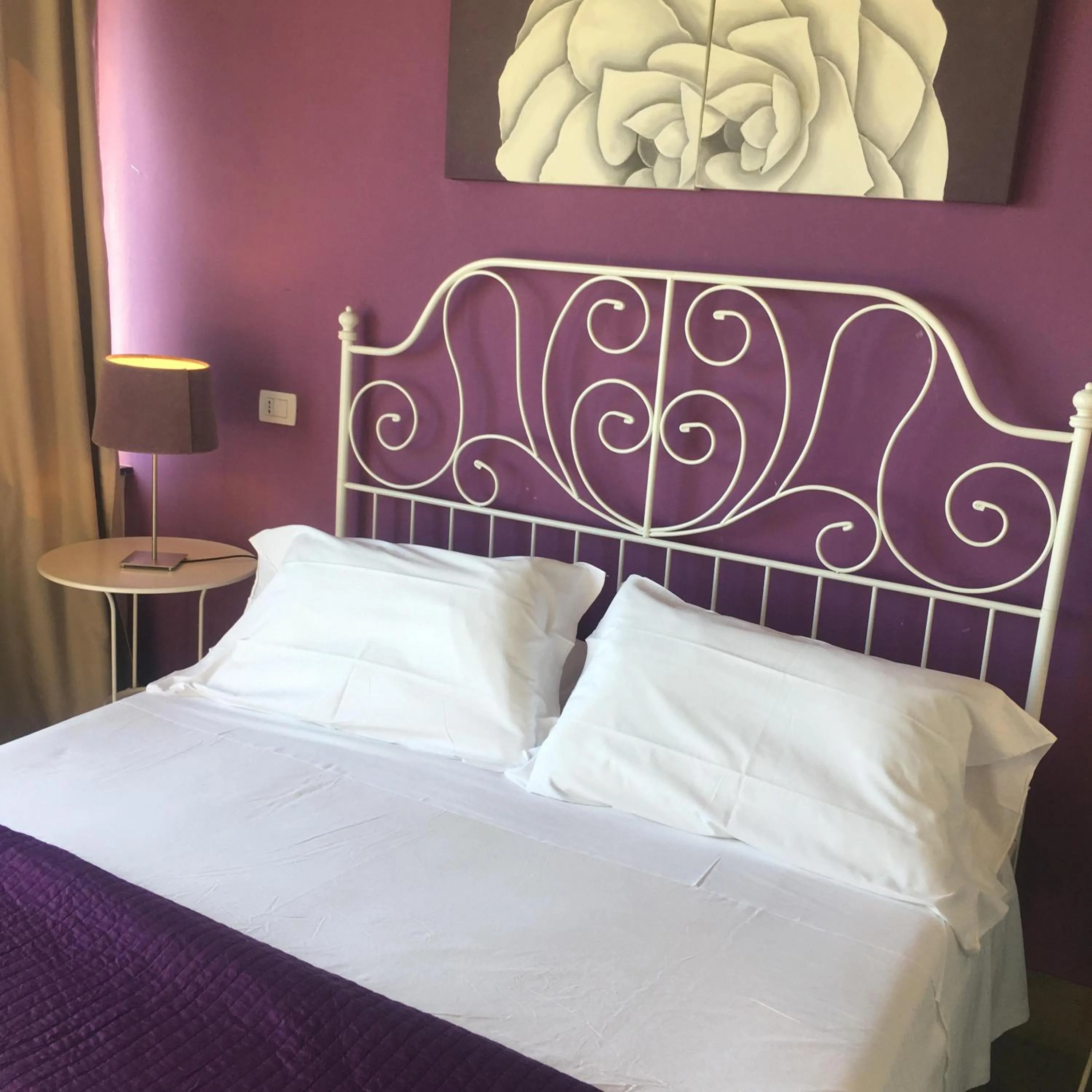 Bed in Michelangelo Etna Hotel