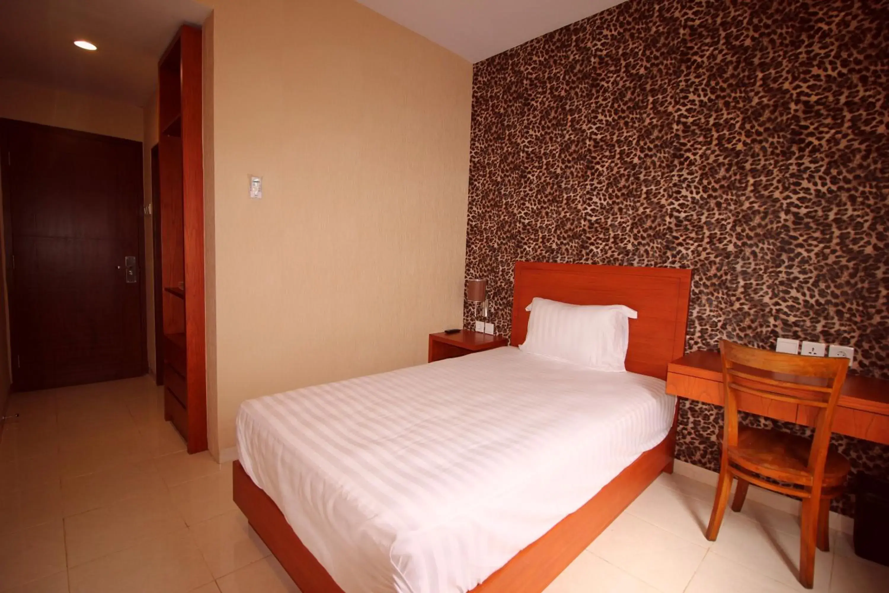 Photo of the whole room, Bed in Amaya Suites Hotel