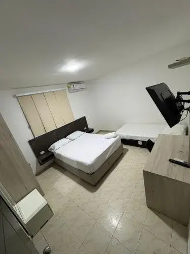 Standard Triple Room - single occupancy in Hotel y Piscina Villa Maria Uribia Standard Triple Room - single occupancy in Hotel y Piscina Villa Maria Uribia
