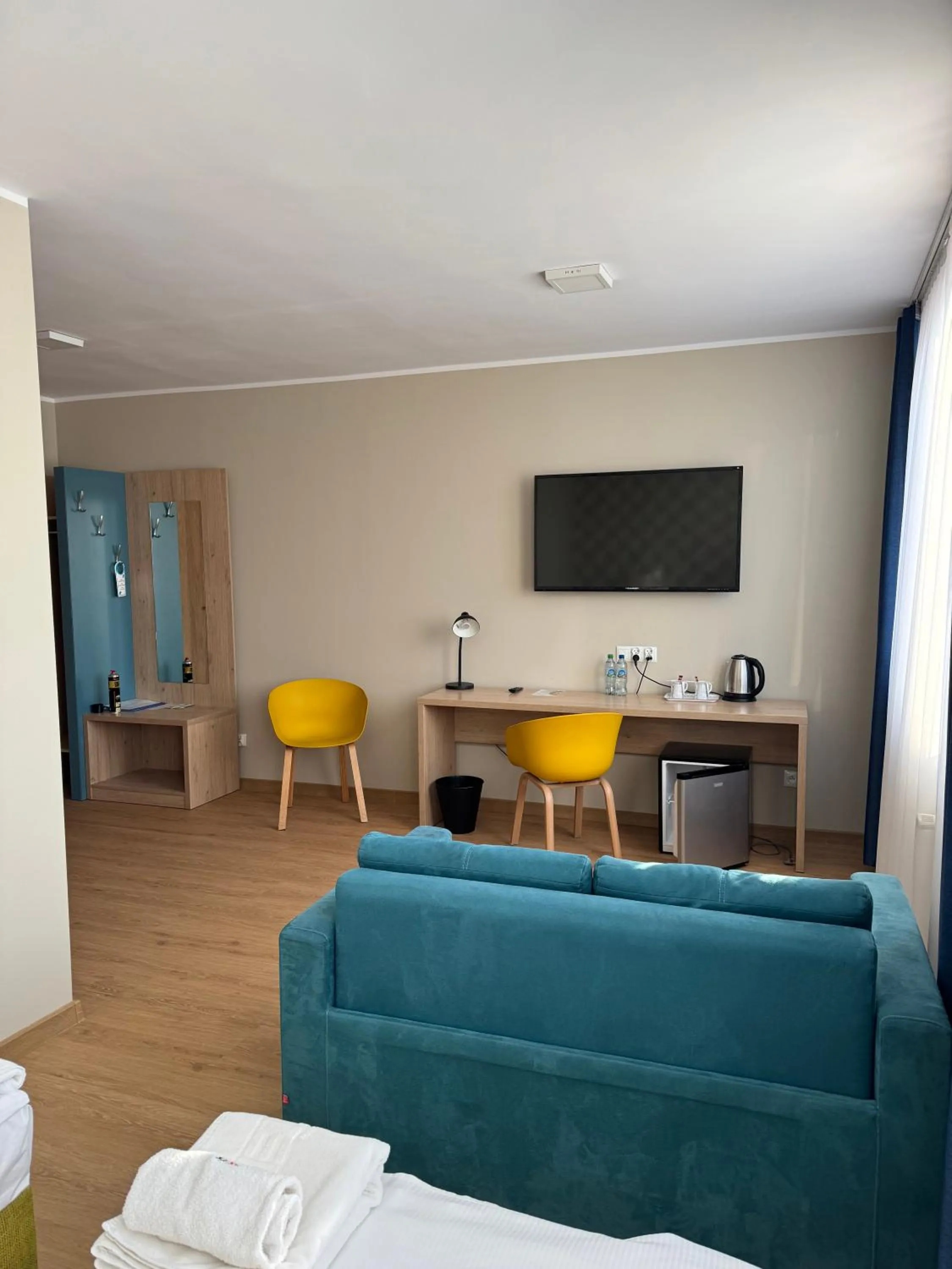 TV and multimedia, Bed in Carina Hotel