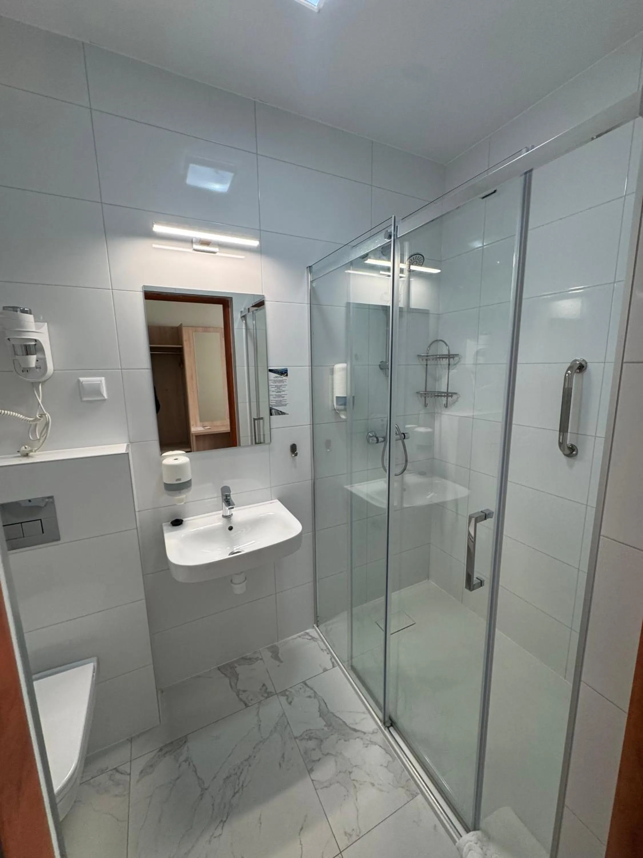 Shower in Carina Hotel