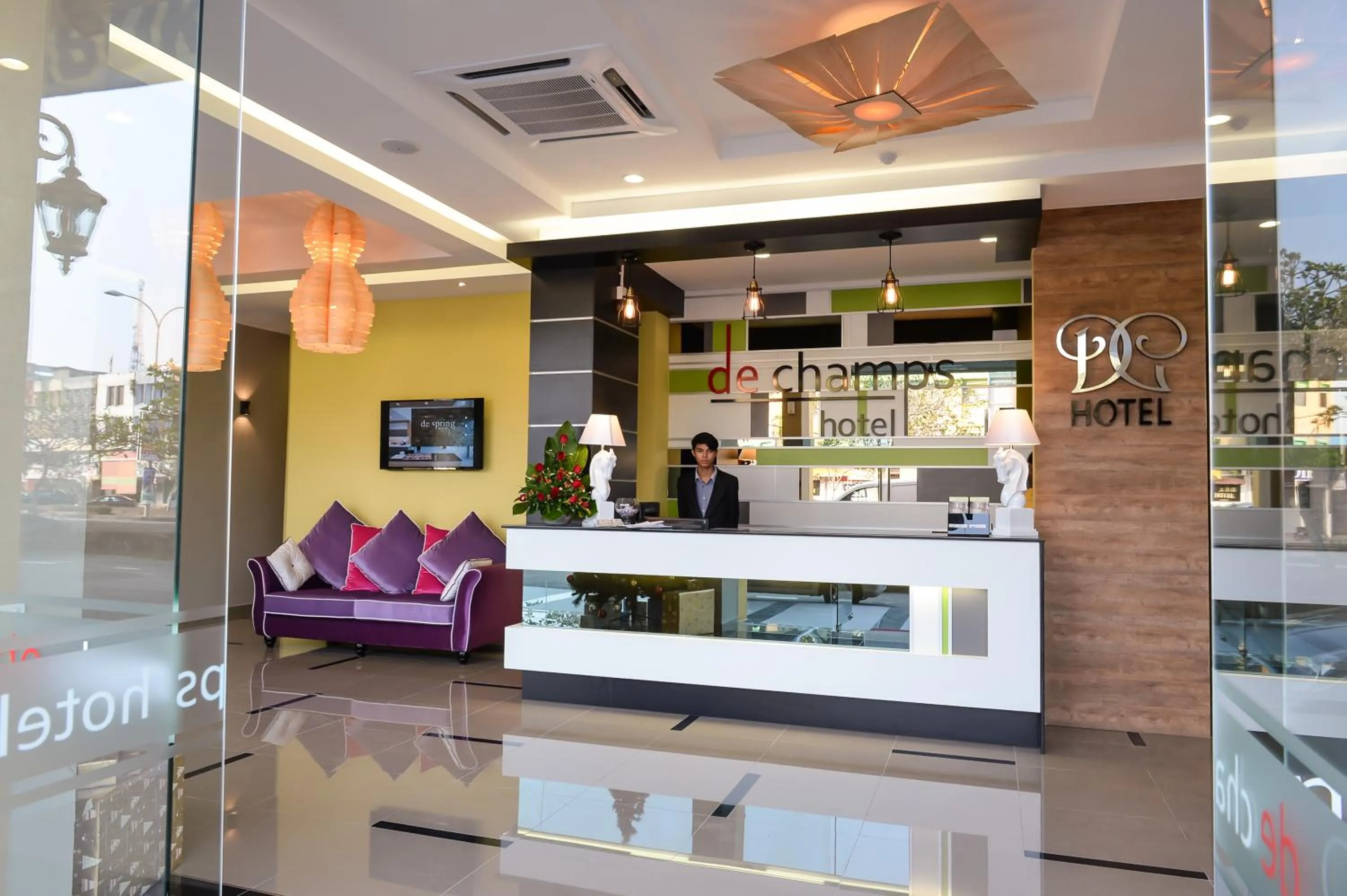 Lobby or reception in De Champs Hotel