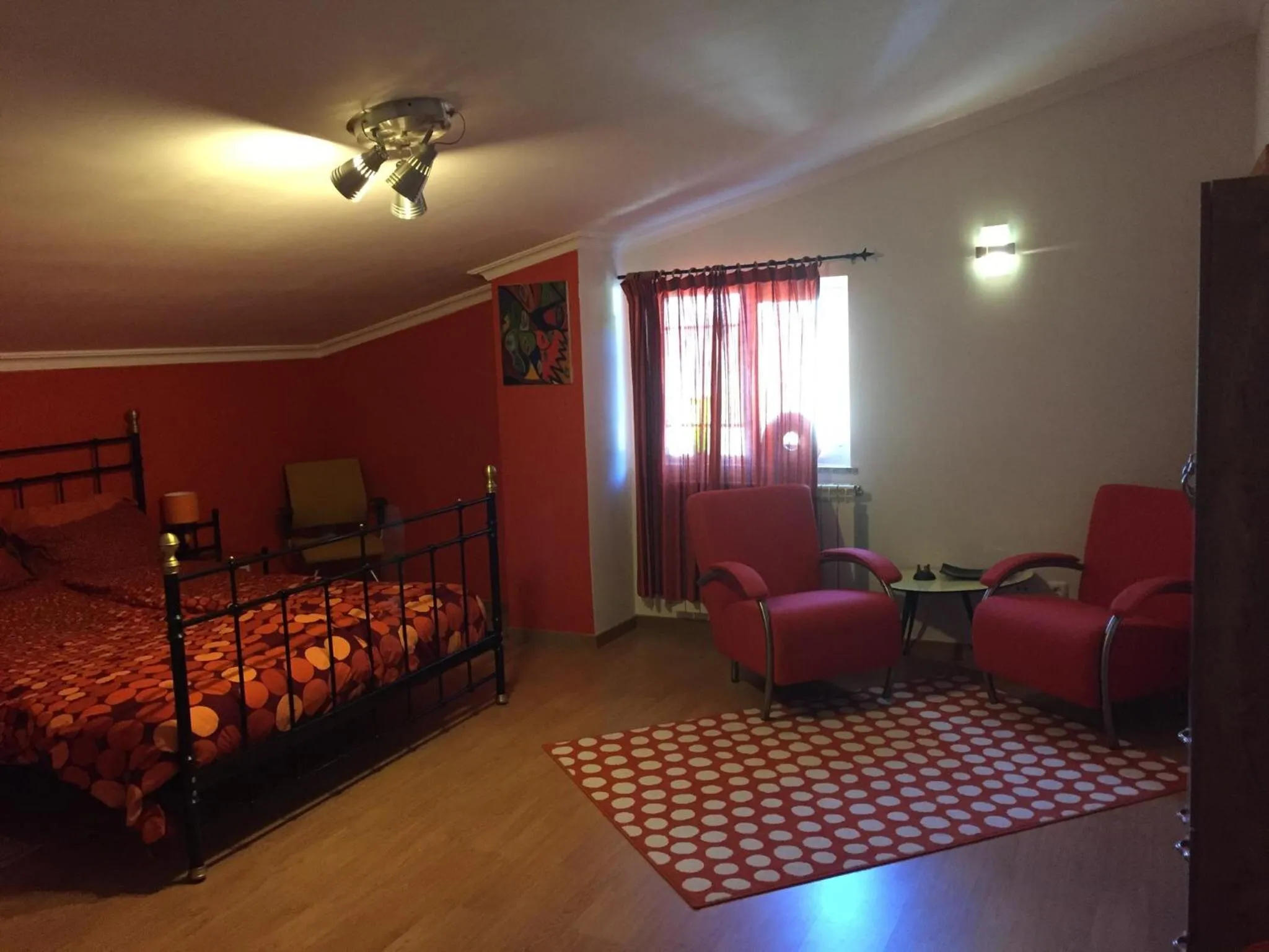 Seating area, Bed in Casa Traca