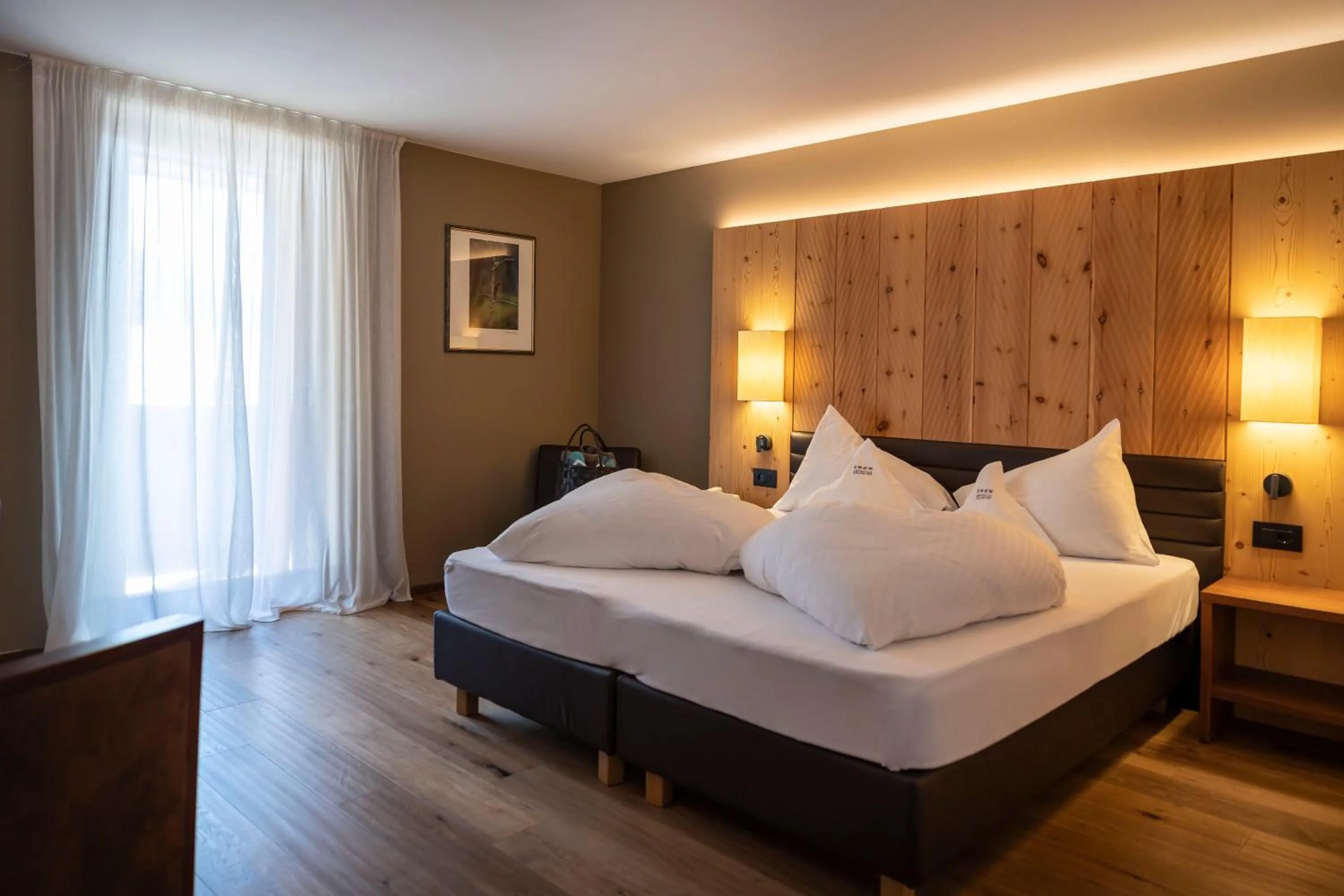 Bedroom, Bed in Artnatur Dolomites Hotel & Spa