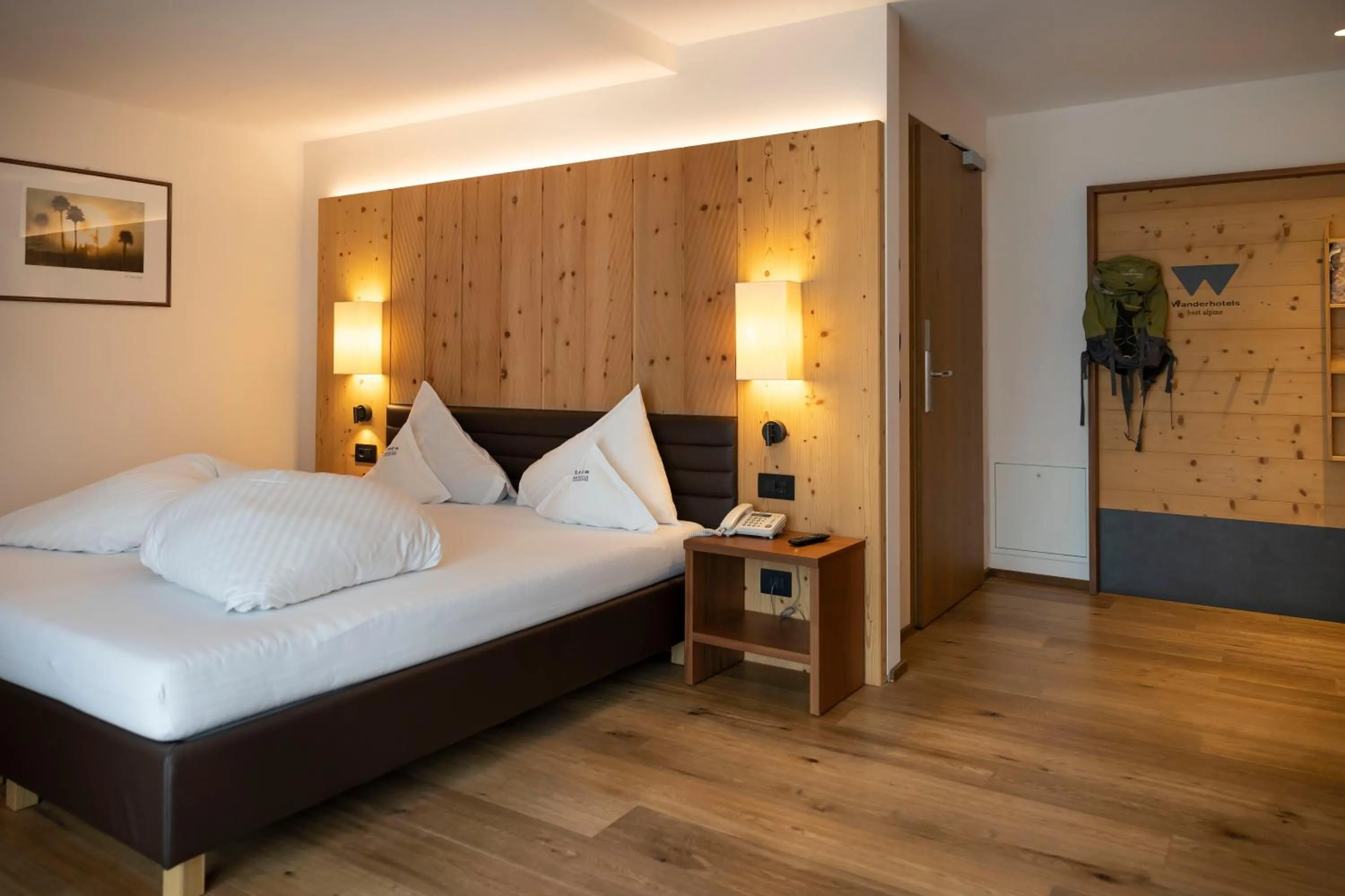 Bedroom, Bed in Artnatur Dolomites Hotel & Spa
