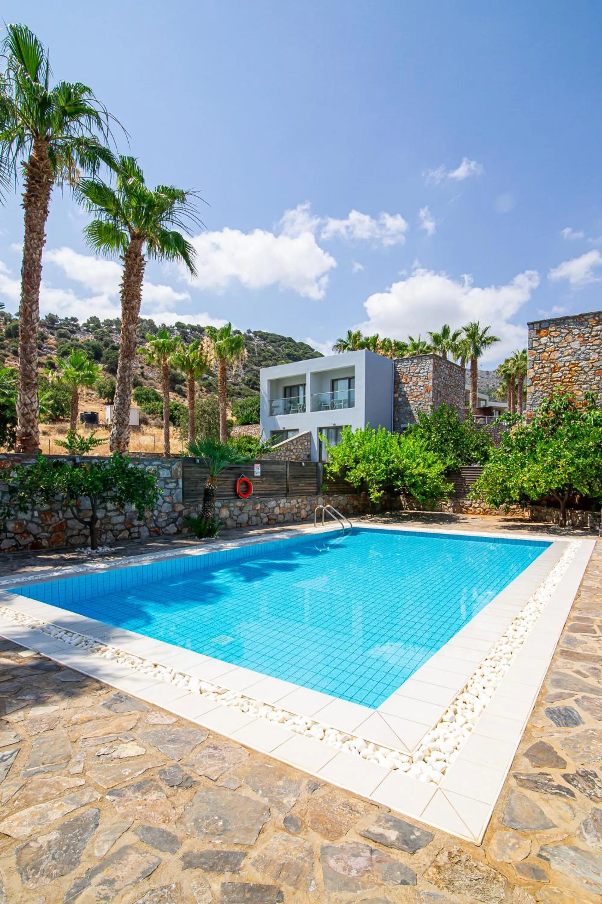 Patio, Swimming Pool in Royal Heights Resort Villas & Spa