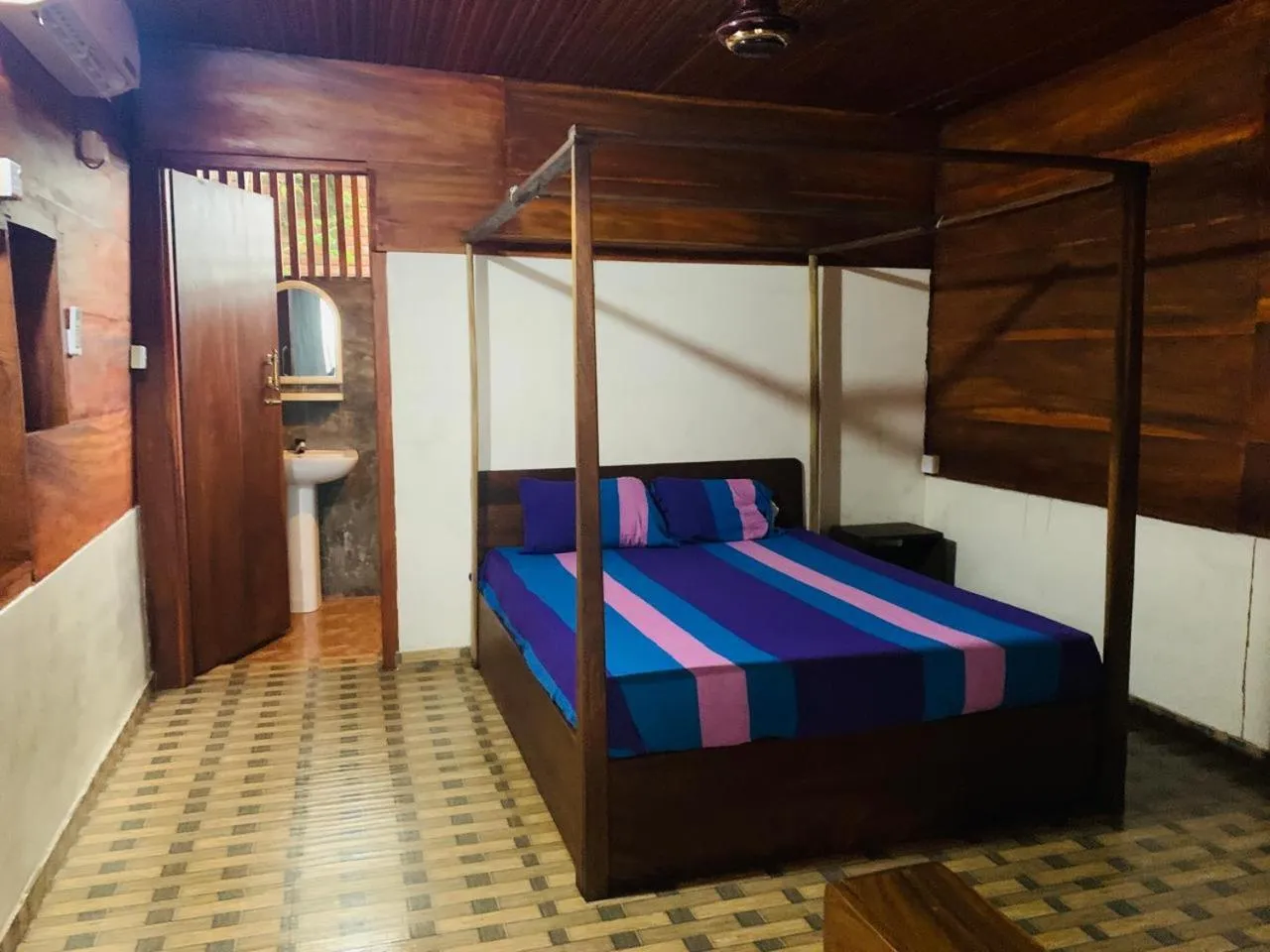 Bed in Shim Beach Resort