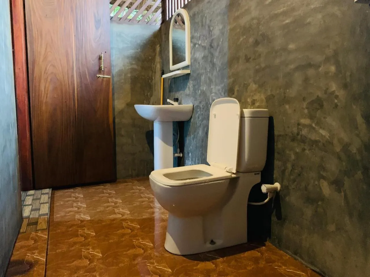Toilet in Shim Beach Resort