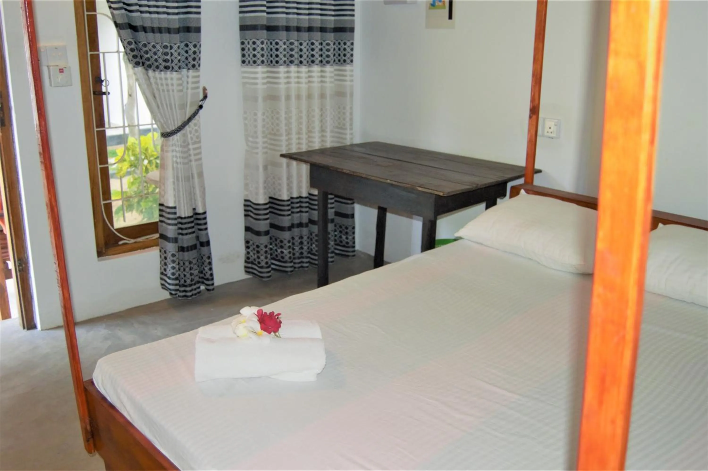 Bed in Shim Beach Resort
