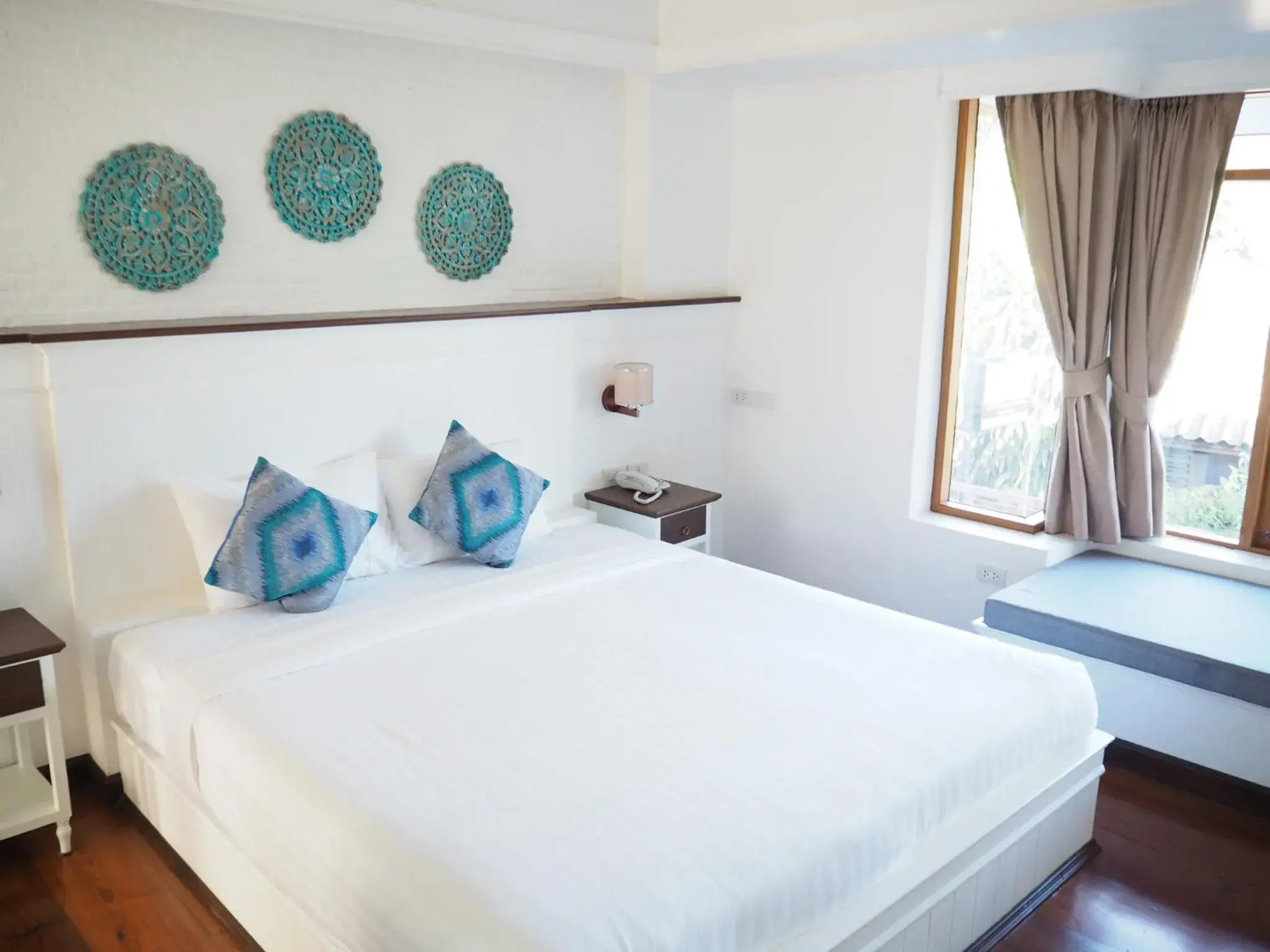 Decorative detail, Bed in Pai Cherkaew Boutique House Decorative detail, Bed in Pai Cherkaew Boutique House