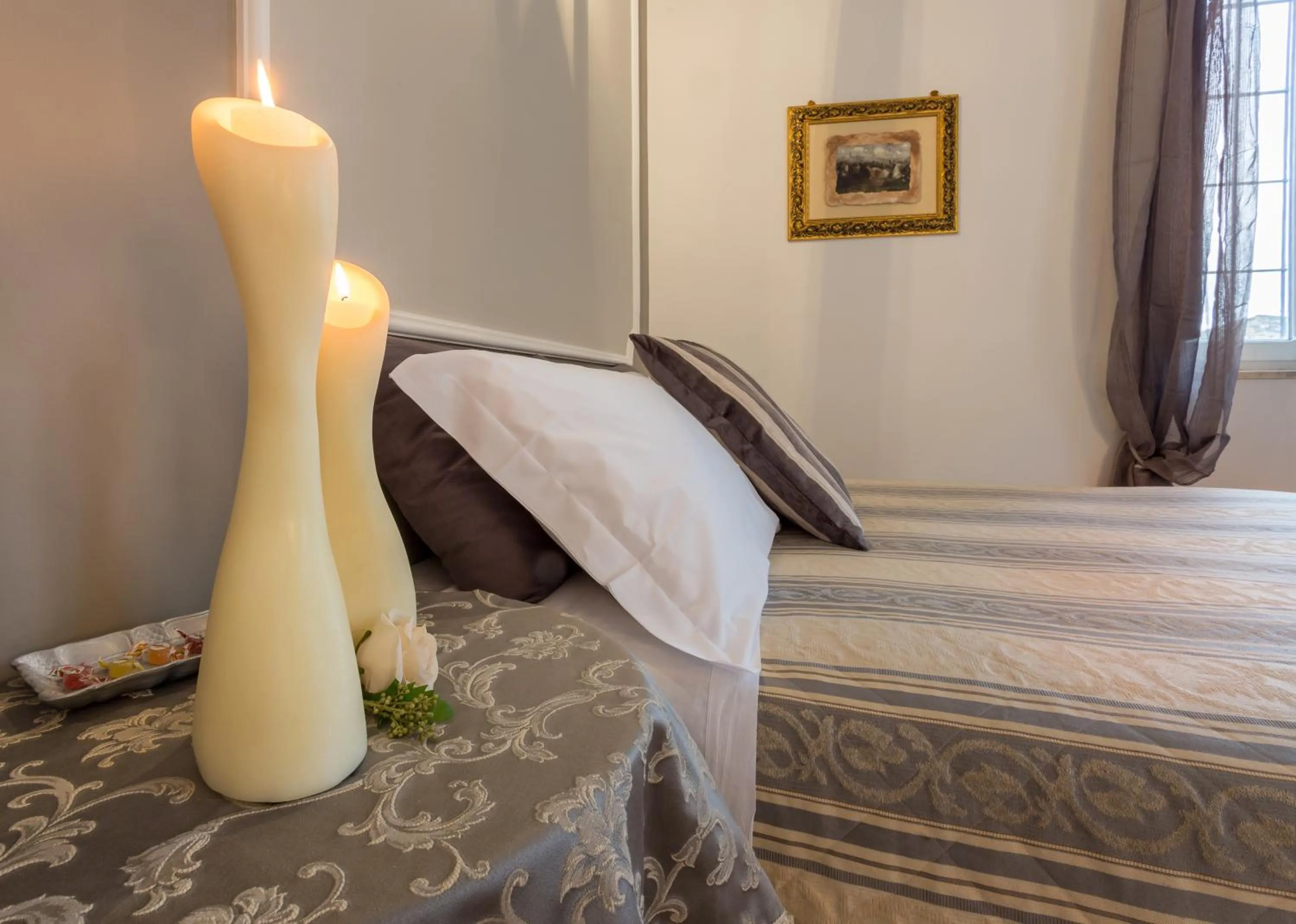 Decorative detail, Bed in Suite Assisi