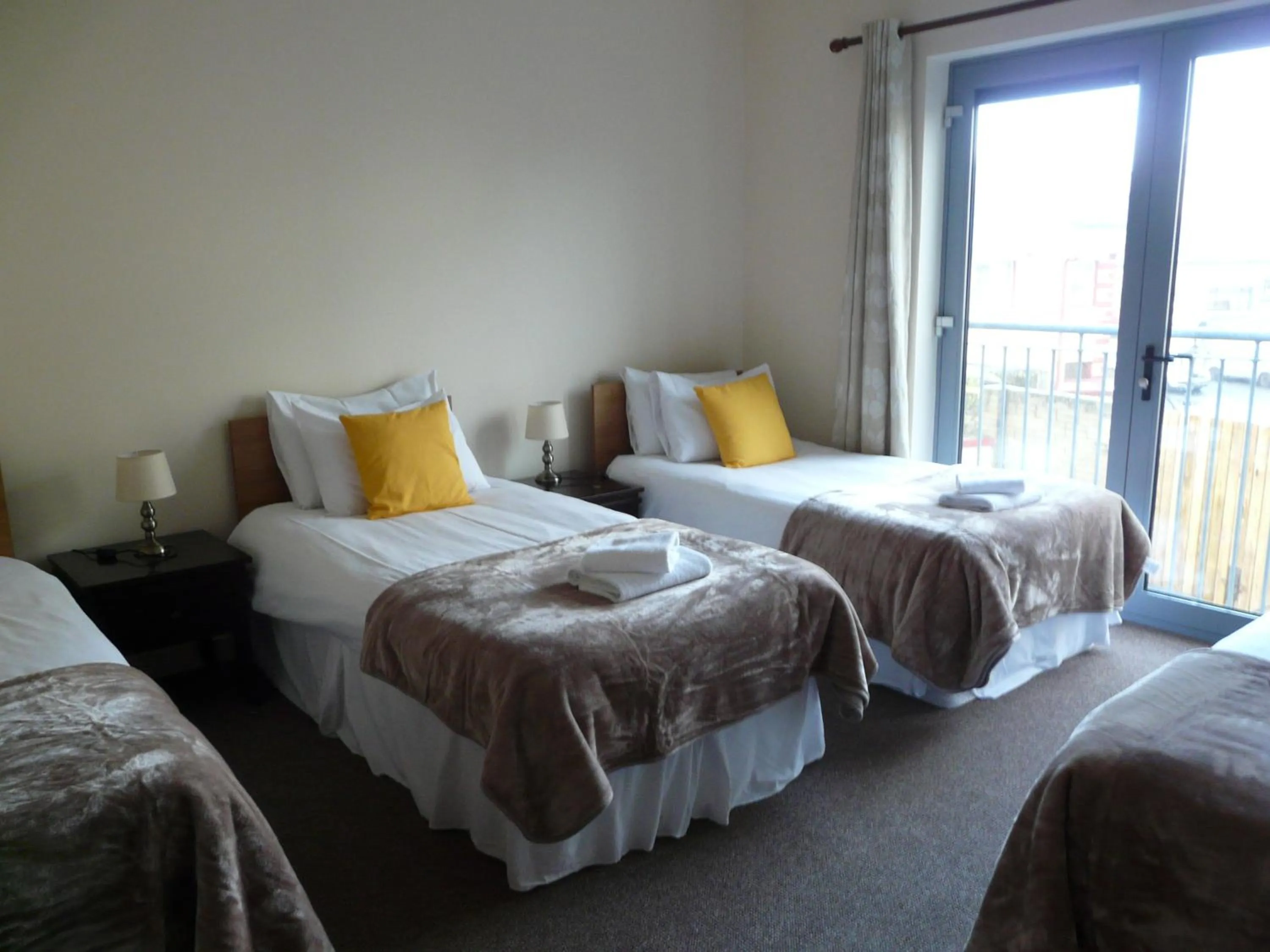 Bed in The Courtyard Apartments