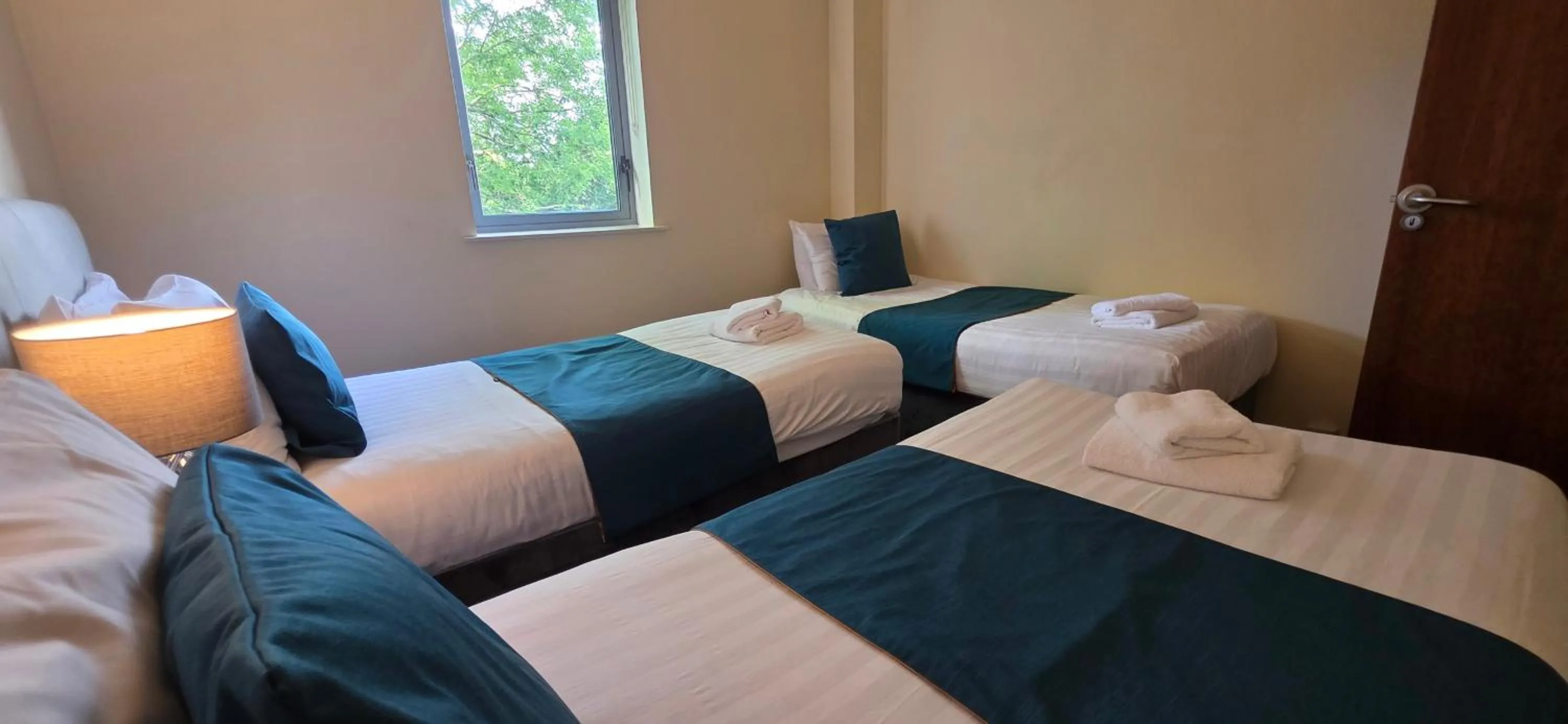 Bed in The Courtyard Apartments