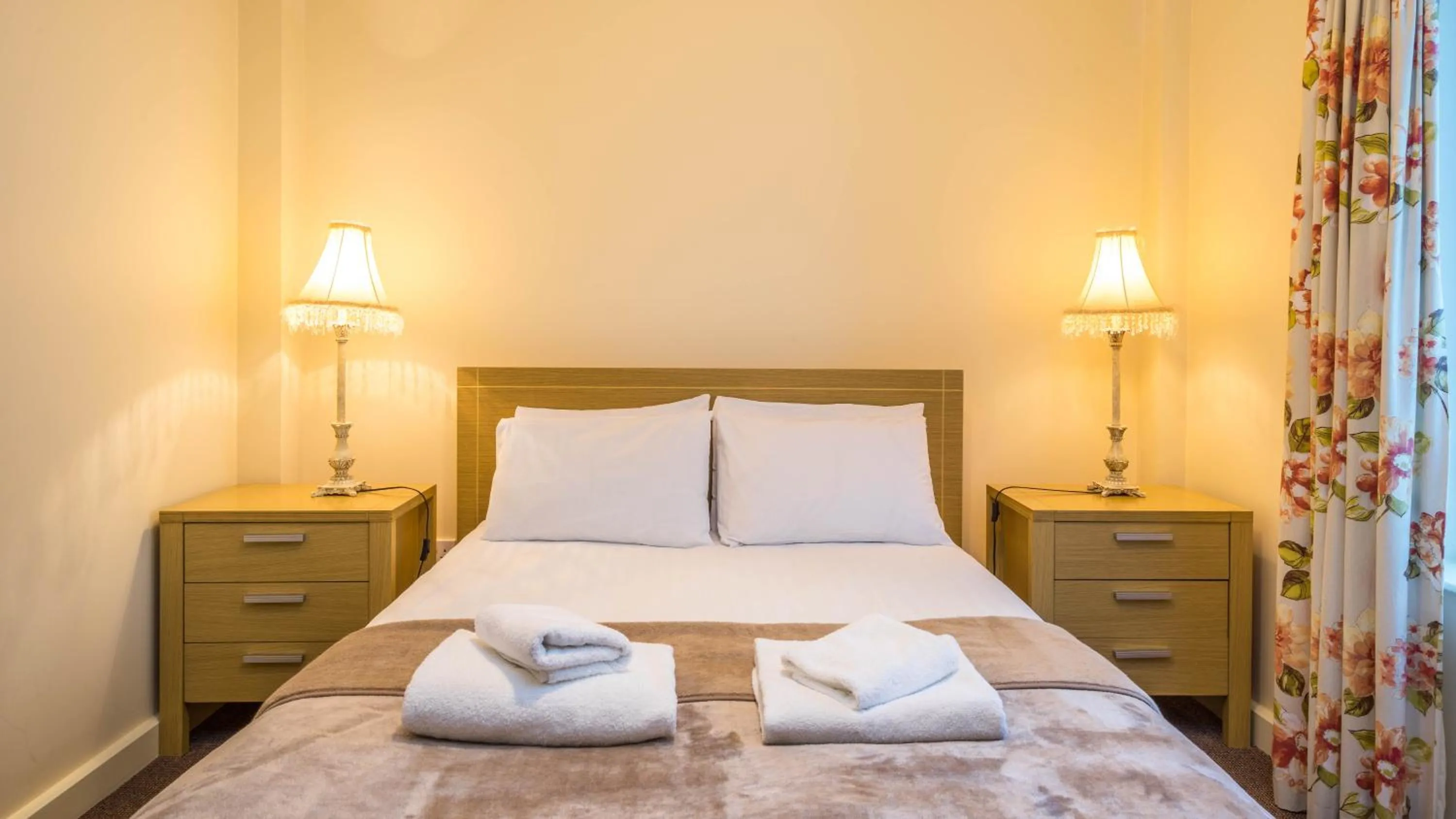 Bed in The Courtyard Apartments