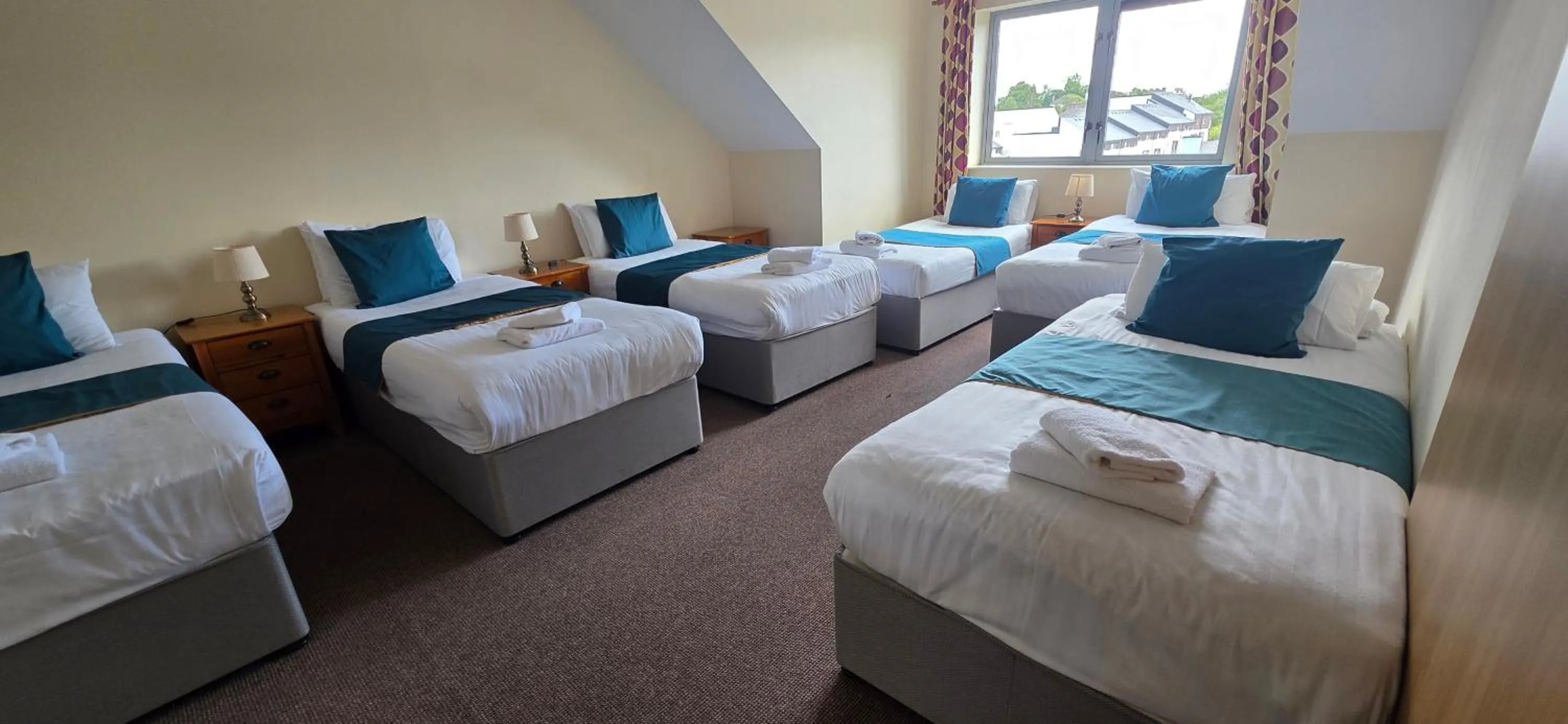 Bed in The Courtyard Apartments