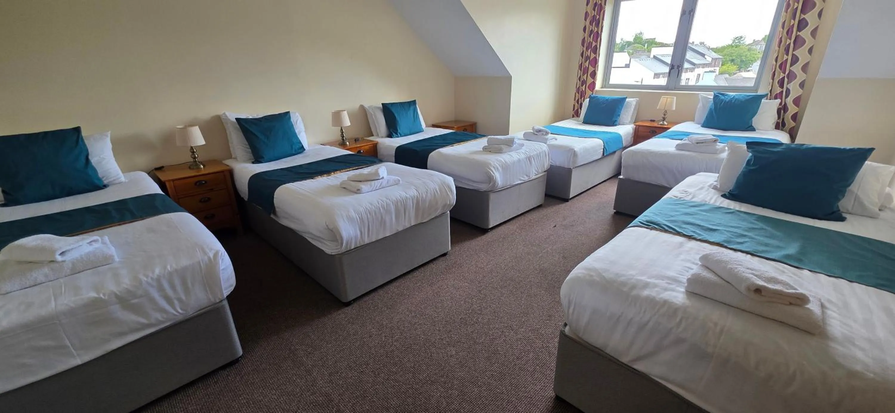 Bed in The Courtyard Apartments