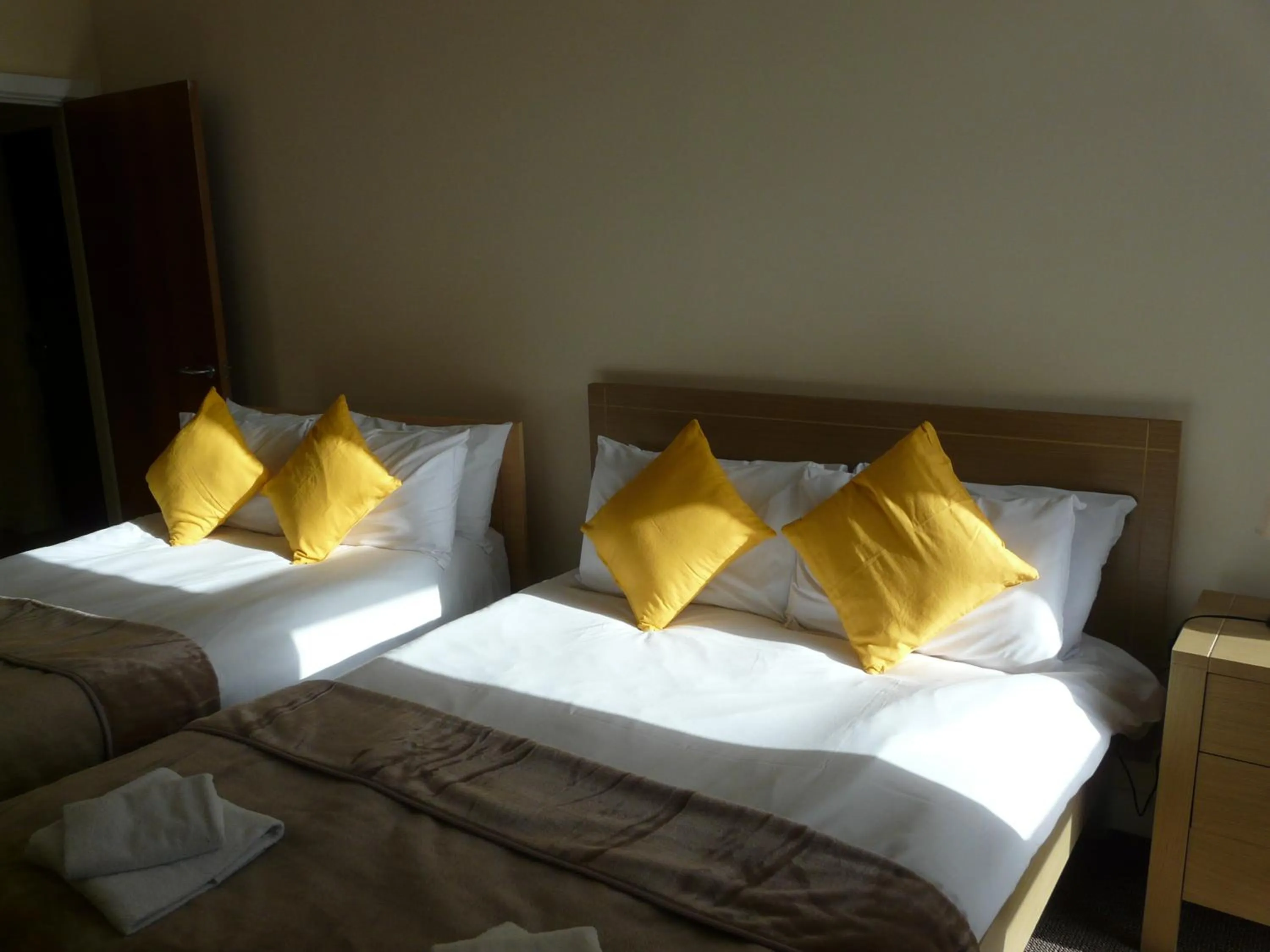 Bed in The Courtyard Apartments