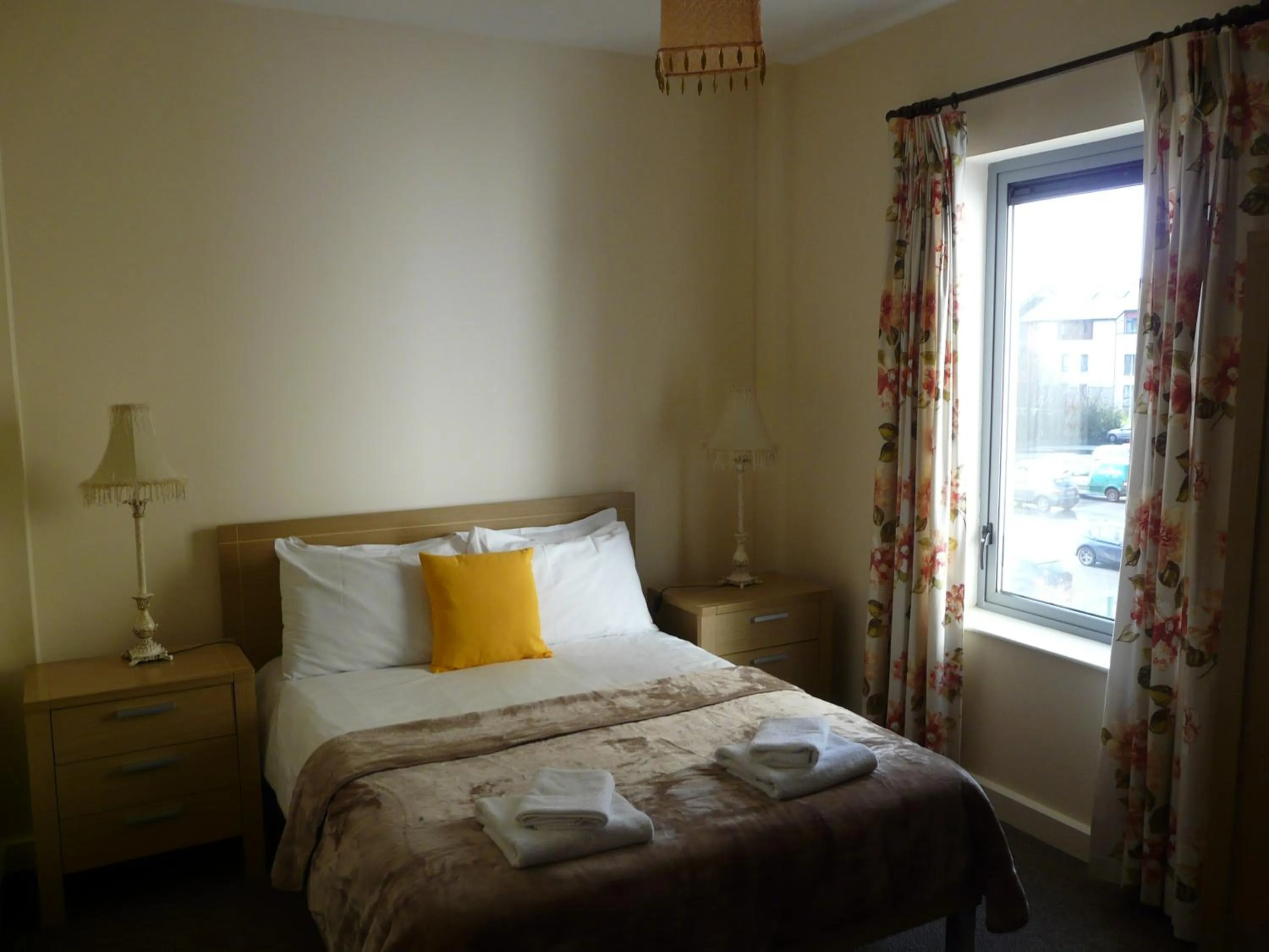 Bed in The Courtyard Apartments