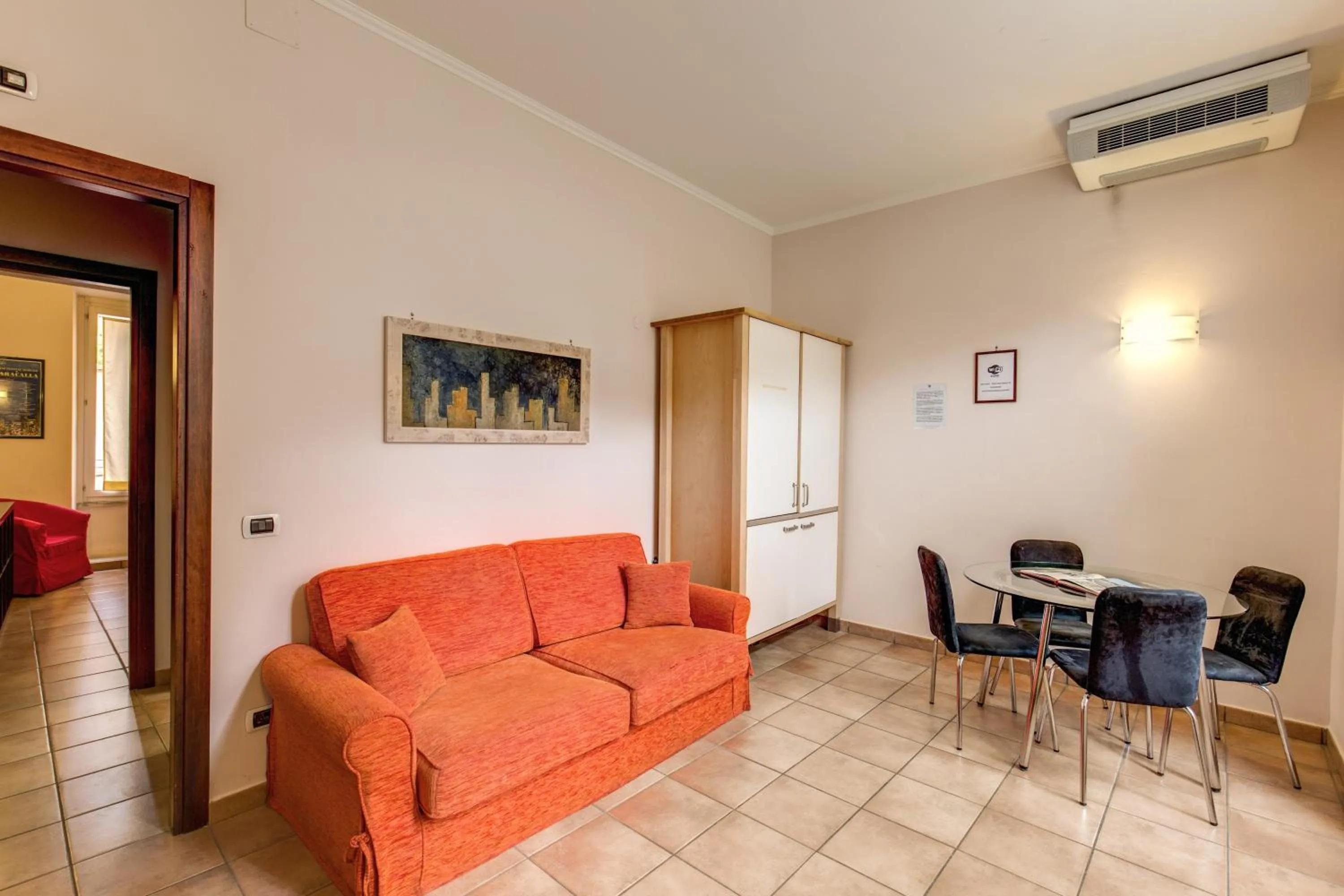 Seating area in Apollo Apartments Colosseo