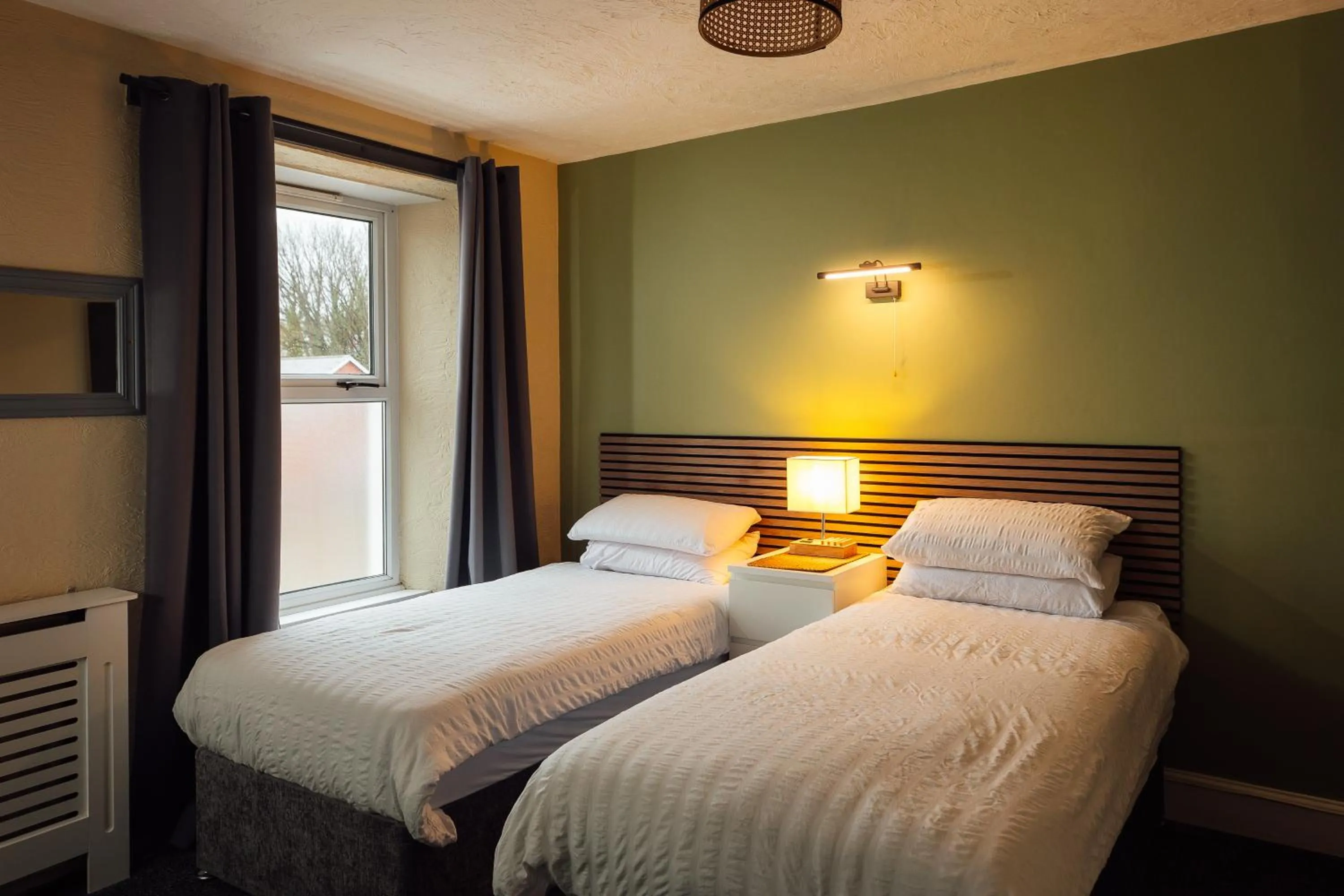 Bed in The Dolphin Hotel & Restaurant