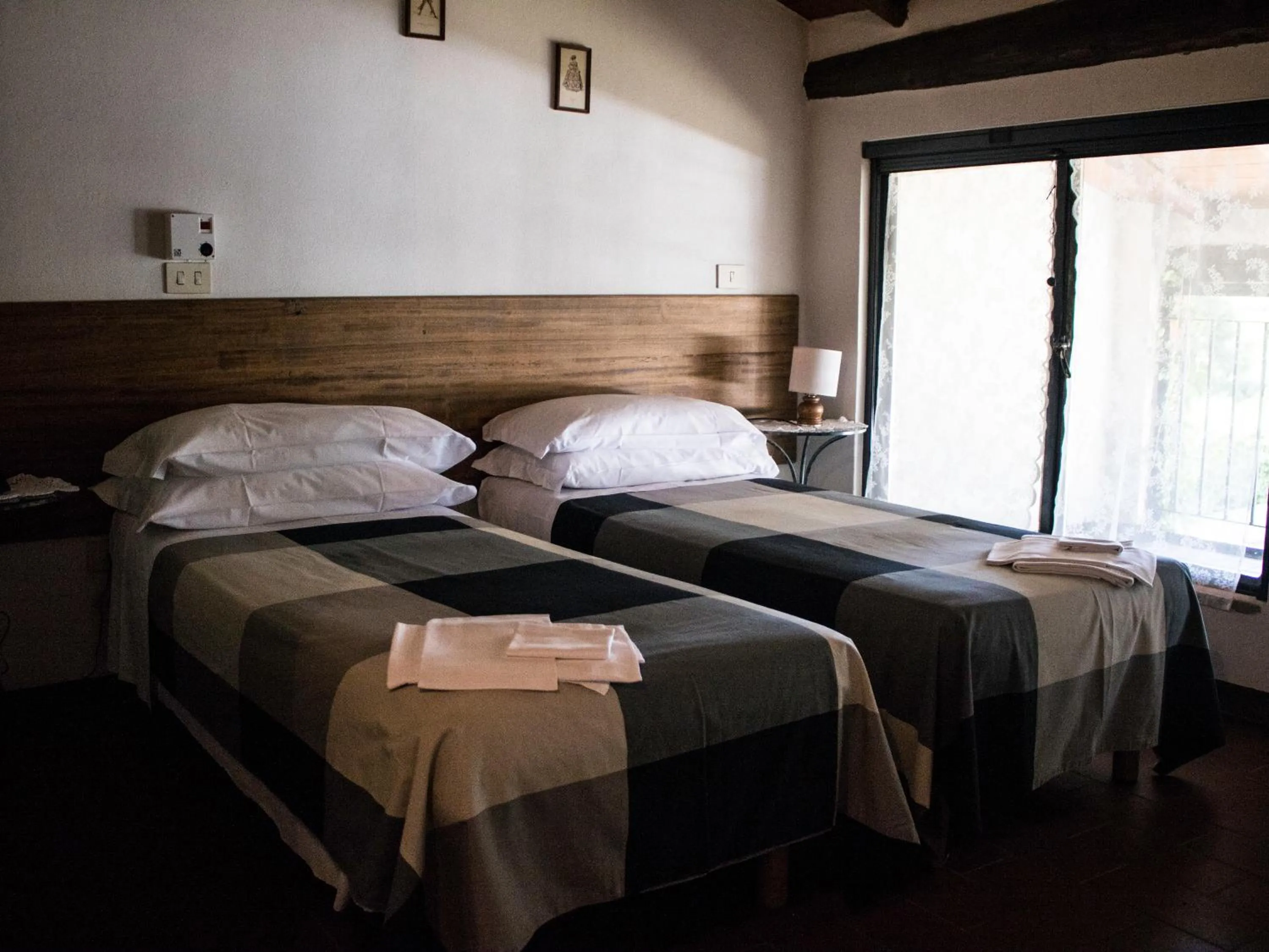Bed in Locanda Casa Motta
