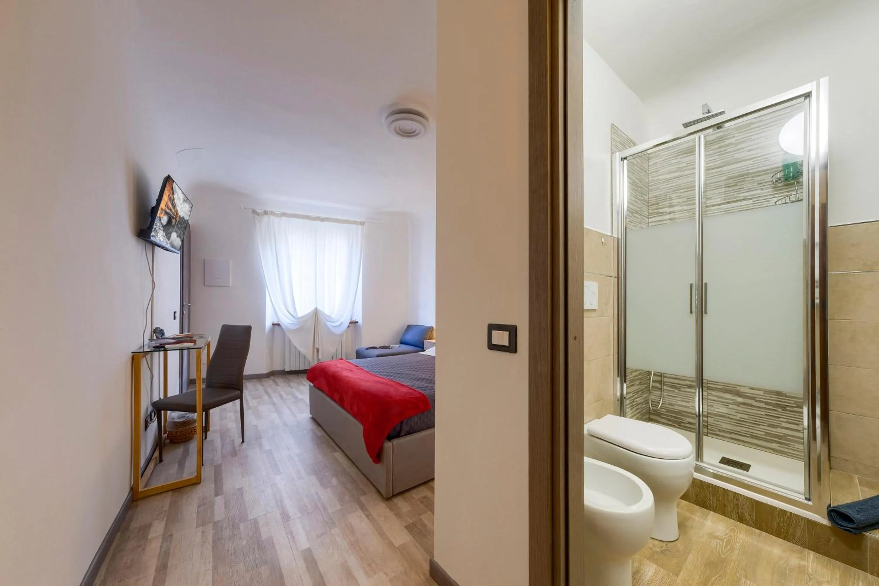 Photo of the whole room in Home Boutique Santa Maria Novella