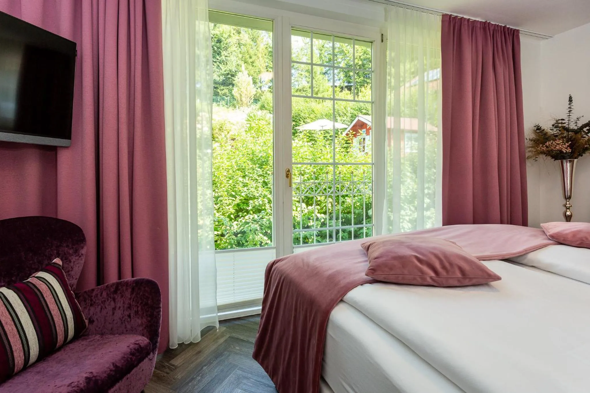 View (from property/room), Bed in Boutiquehotel Bergvilla