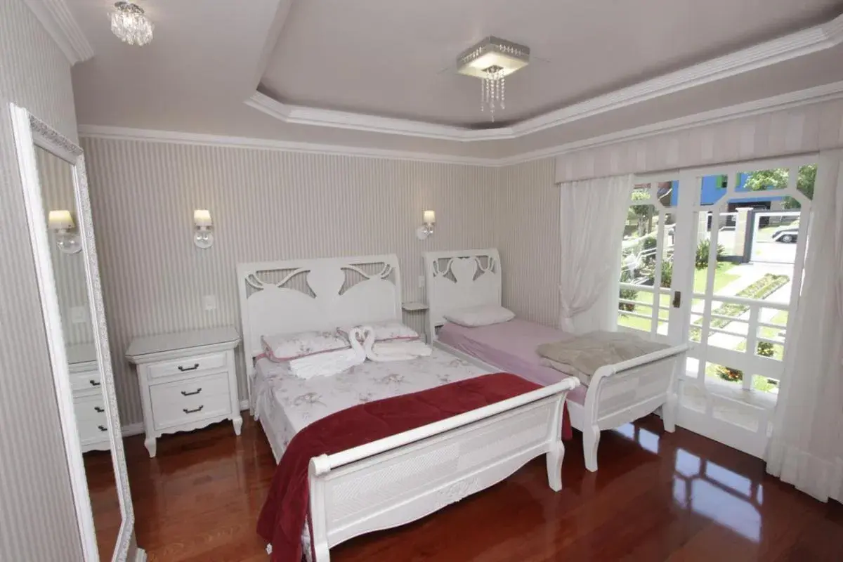 Triple Room with Balcony in Casa da Fabi Triple Room with Balcony in Casa da Fabi