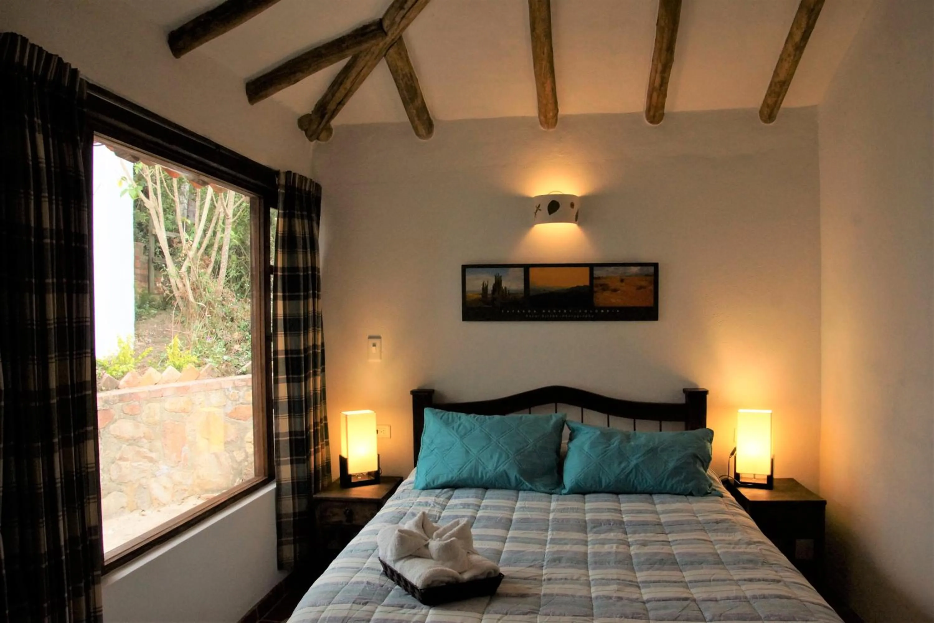 Photo of the whole room, Bed in Renacer