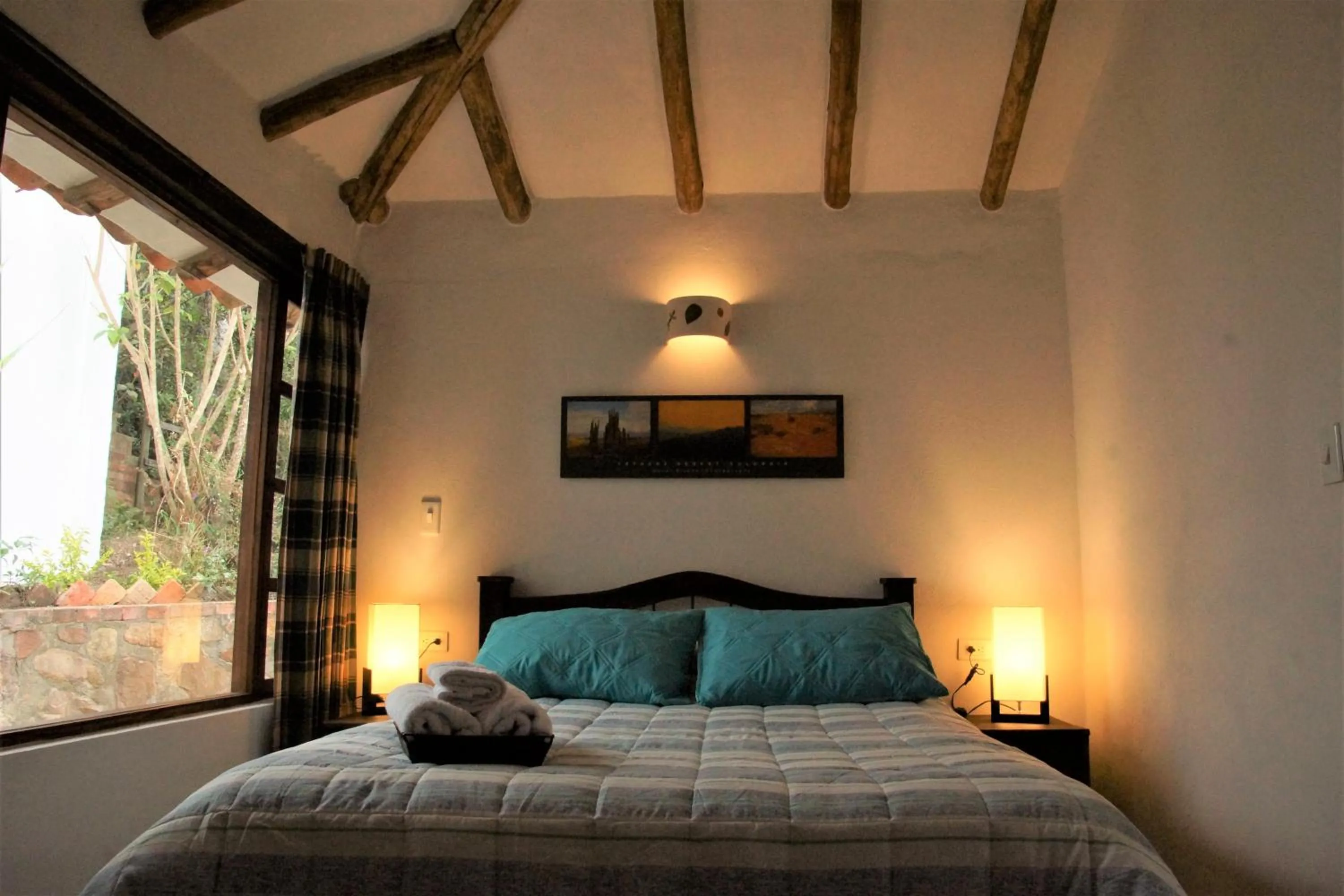 Photo of the whole room, Bed in Renacer