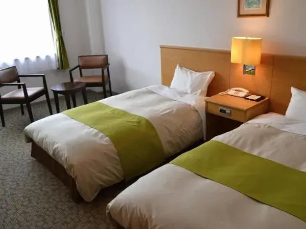 Photo of the whole room, Bed in Hotel Familio Minakami Photo of the whole room, Bed in Hotel Familio Minakami