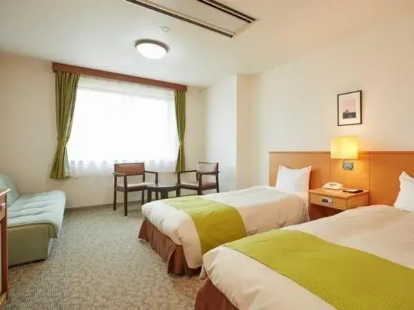 Bed in Hotel Familio Minakami Bed in Hotel Familio Minakami