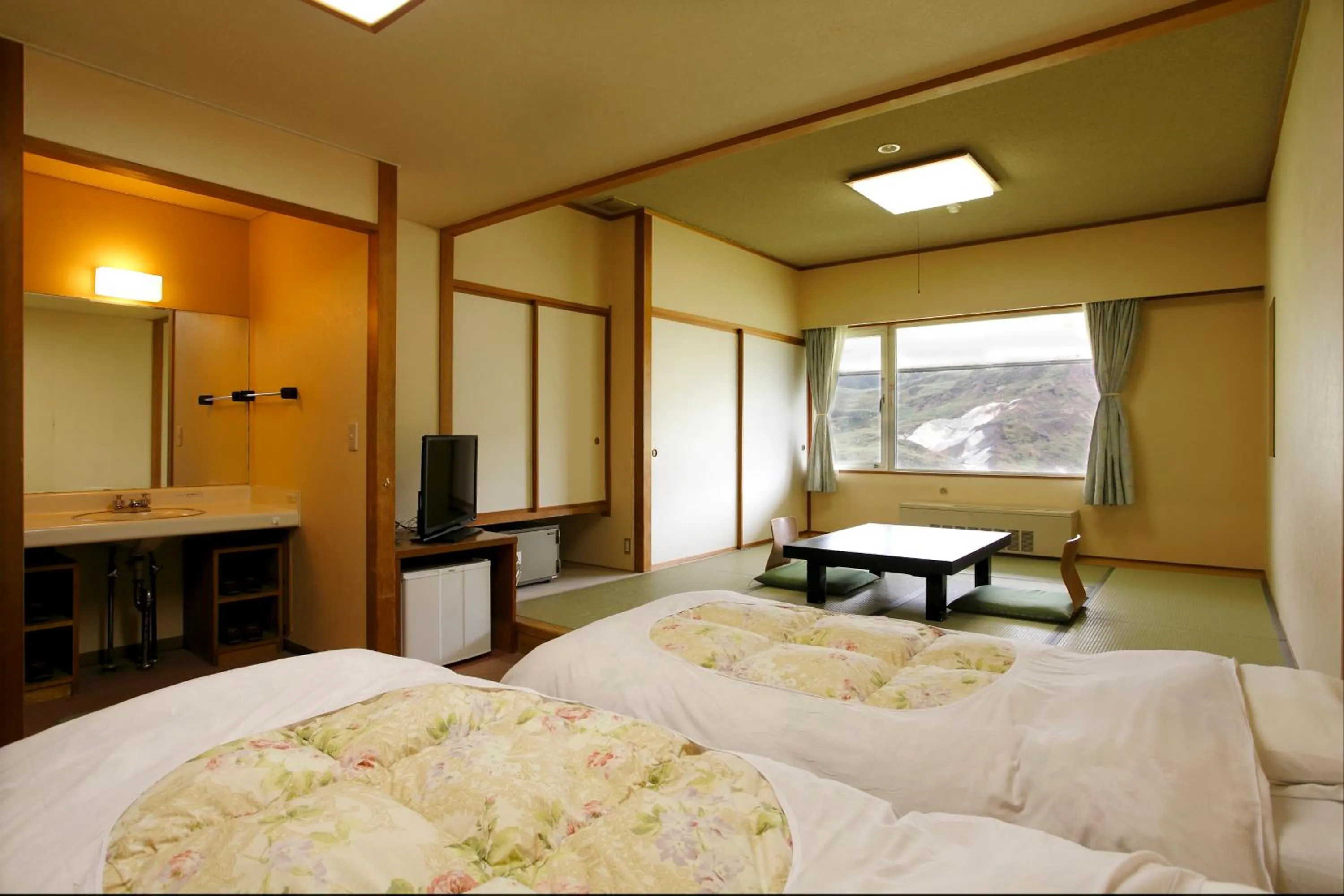 Bed in Manza Hotel Juraku