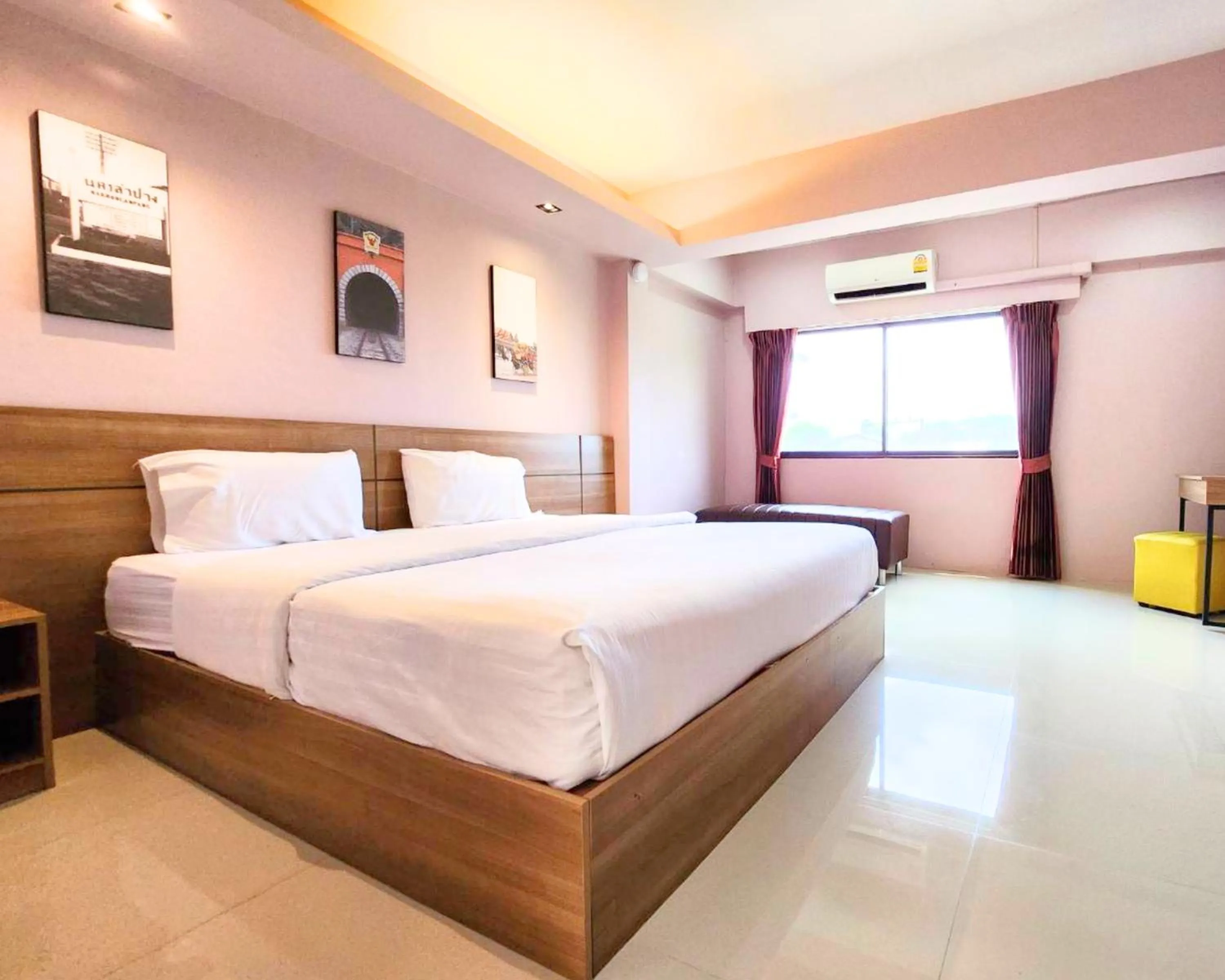 Bed in AIRBEST Gemtree Lampang Hotel